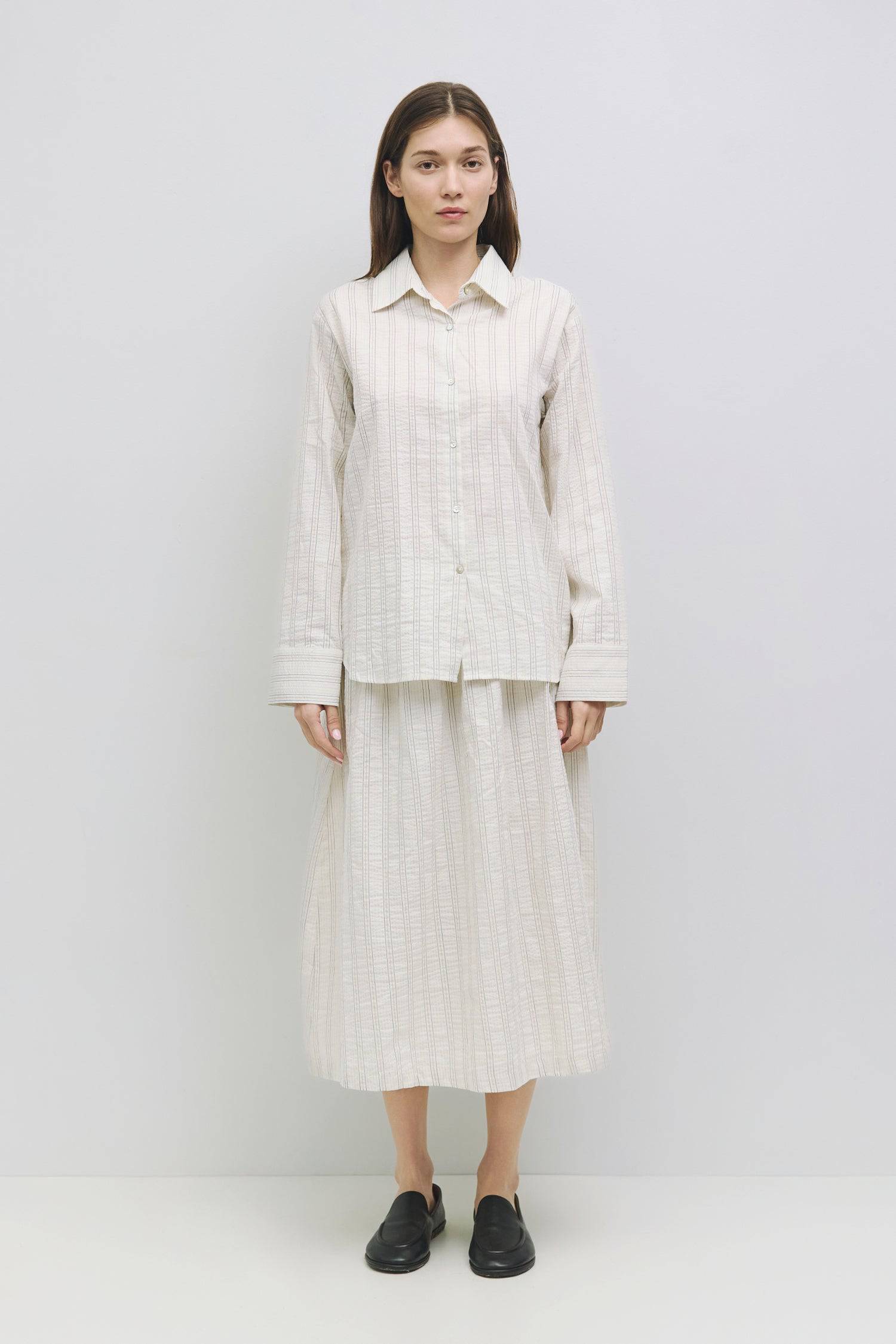 8929226064093, The Joanne Top, Tops, Mod Ref, All Row,allrow,Basics,Button down,Button Down Shirt,Casual,cf-color-blue,cf-size-l,cf-size-m,cf-size-s,cf-vendor-all-row,collared,Collared Top,Cuffed,layer,layered,layering,Layers,leightweight,Long Sleeve,Long Sleeve Shirt,Long Sleeve Top,new,Oversized,Pinstripes,spring,Striped,summer,Transitional,Women's, Information The Joanne Top is a lightweight linen-cotton button-down shirt featuring long sleeves and a classic collar neckline, designed with a striped patte