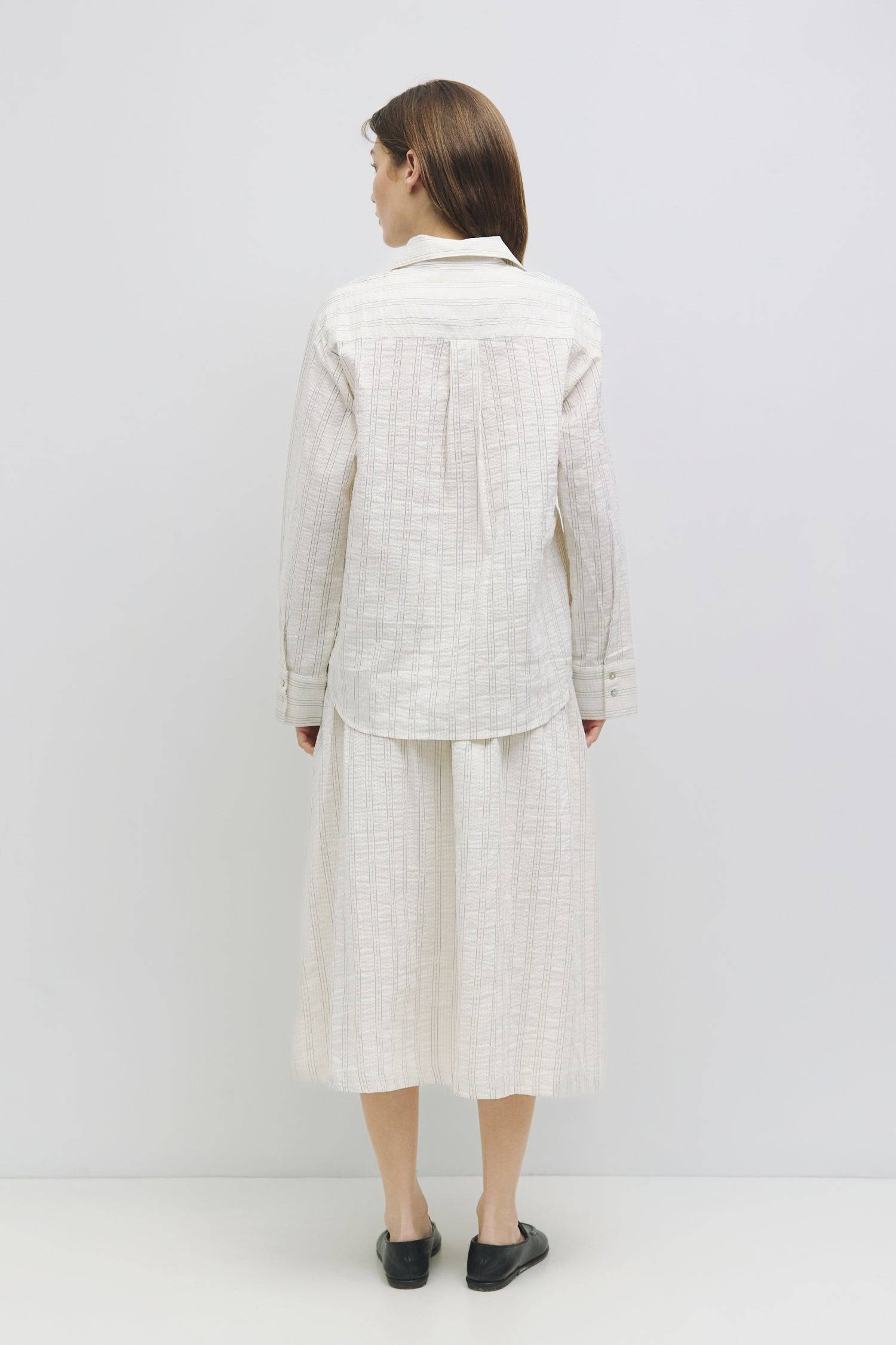 8929226064093, The Joanne Top, Tops, Mod Ref, All Row,allrow,Basics,Button down,Button Down Shirt,Casual,cf-color-blue,cf-size-l,cf-size-m,cf-size-s,cf-vendor-all-row,collared,Collared Top,Cuffed,layer,layered,layering,Layers,leightweight,Long Sleeve,Long Sleeve Shirt,Long Sleeve Top,new,Oversized,Pinstripes,spring,Striped,summer,Transitional,Women's, Information The Joanne Top is a lightweight linen-cotton button-down shirt featuring long sleeves and a classic collar neckline, designed with a striped patte