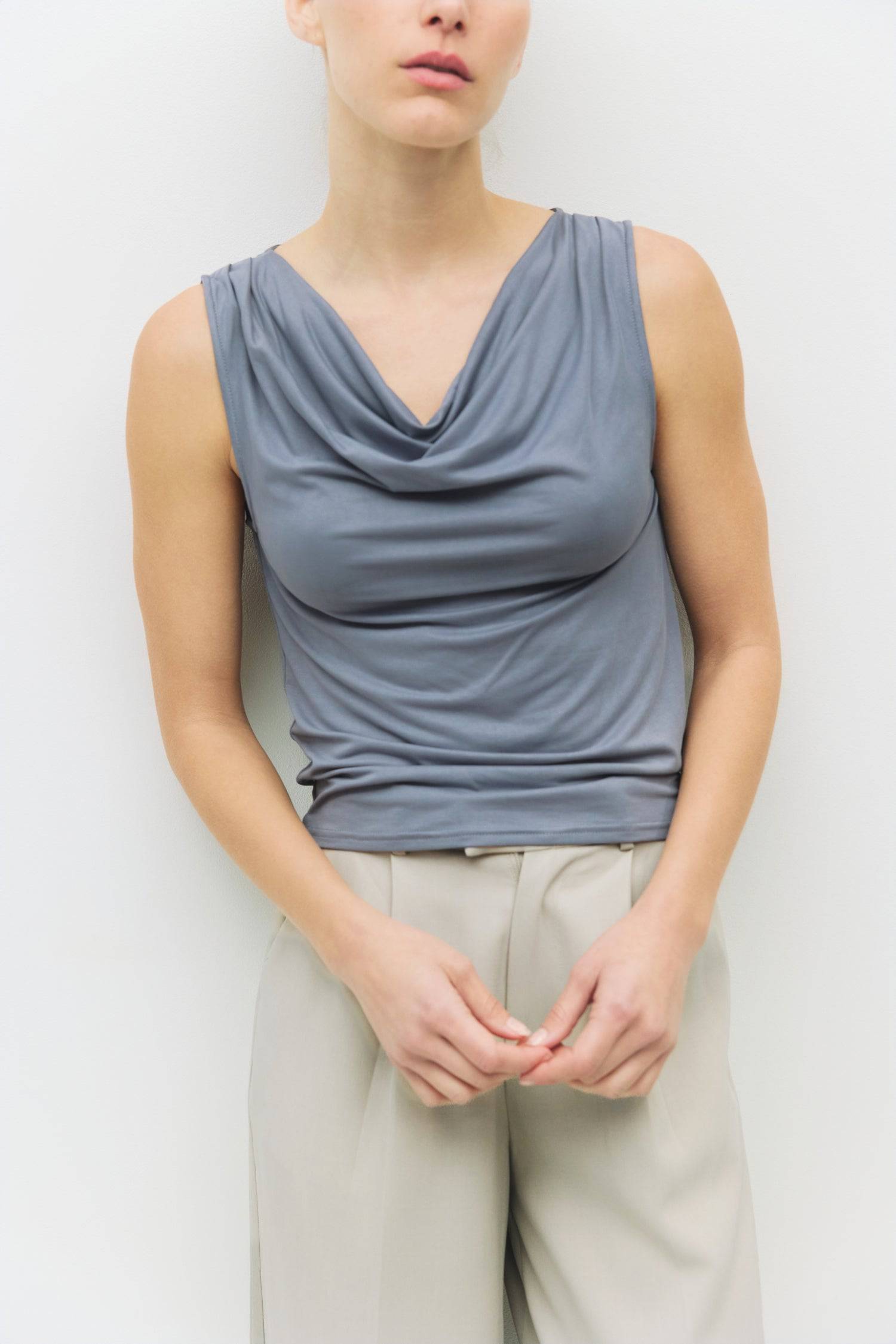 8983730028765, The Amal Top, Tops, Mod Ref, All Row,allrow,Black,Casual,cf-color-black,cf-color-blush,cf-color-charcoal,cf-color-olive,cf-color-white,cf-size-l,cf-size-m,cf-size-s,cf-vendor-all-row,Charcoal,Cowl,cowl neck,Cozy,Draped,ivory,Khaki,knit,Knit Top,Long Sleeve,Long Sleeve Top,Matching Set,modal,new,set,Sets,Short Sleeve,Spring,Summer,texture,thin,Women's,womens top, Information The Amal Top is a fitted modal knit top featuring a cozy cowl neckline and pleated shoulder details for a touch of elega