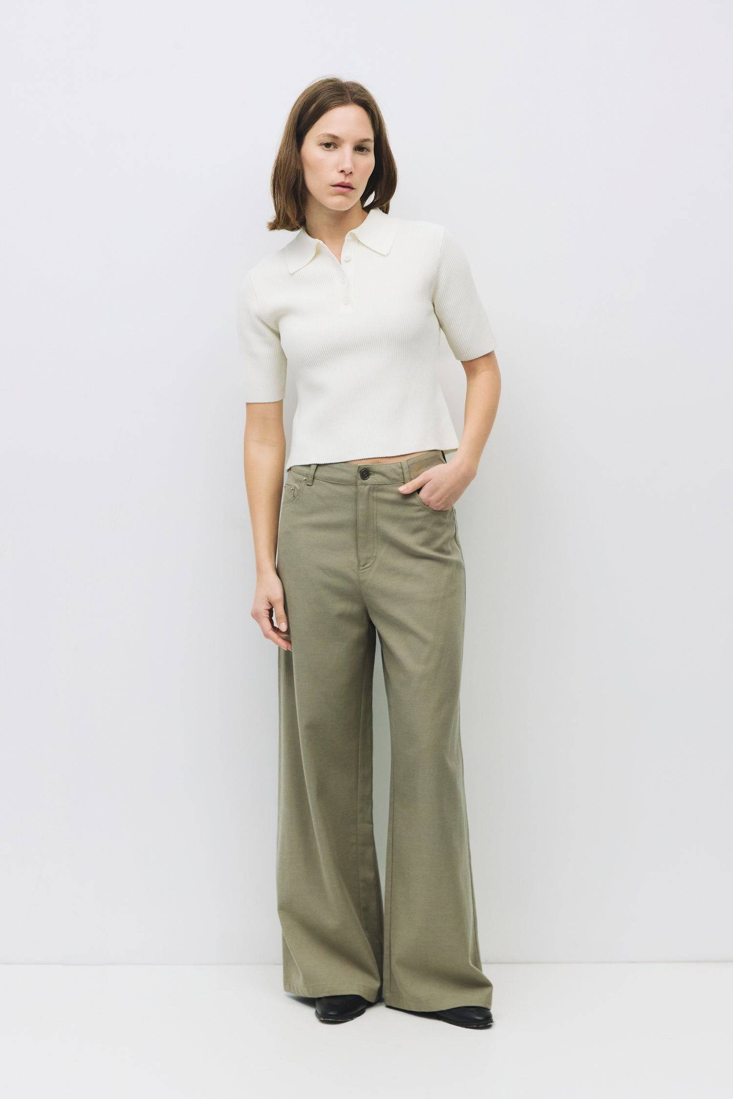 8954057490653, The Marina Top, Tops, Mod Ref, Black,Casual,cf-size-l,cf-size-m,cf-size-s,cf-size-xl,cf-vendor-all-row,Collar,collared,Collared Top,Comfortable,Cream,Crew Neckline,Everyday,Form Fitting,Grey,Layers,Lightweight,Minimal,new,Rib Knit,Ribbed,Ribbed Top,Spring,Trendy,Women's, Information The Marina Top features a chic collared neckline with a mid-front placket and rich ribbed knitting for added texture. With its mid-bicep sleeve length, it’s a versatile piece that’s easy to dress up or wear casual