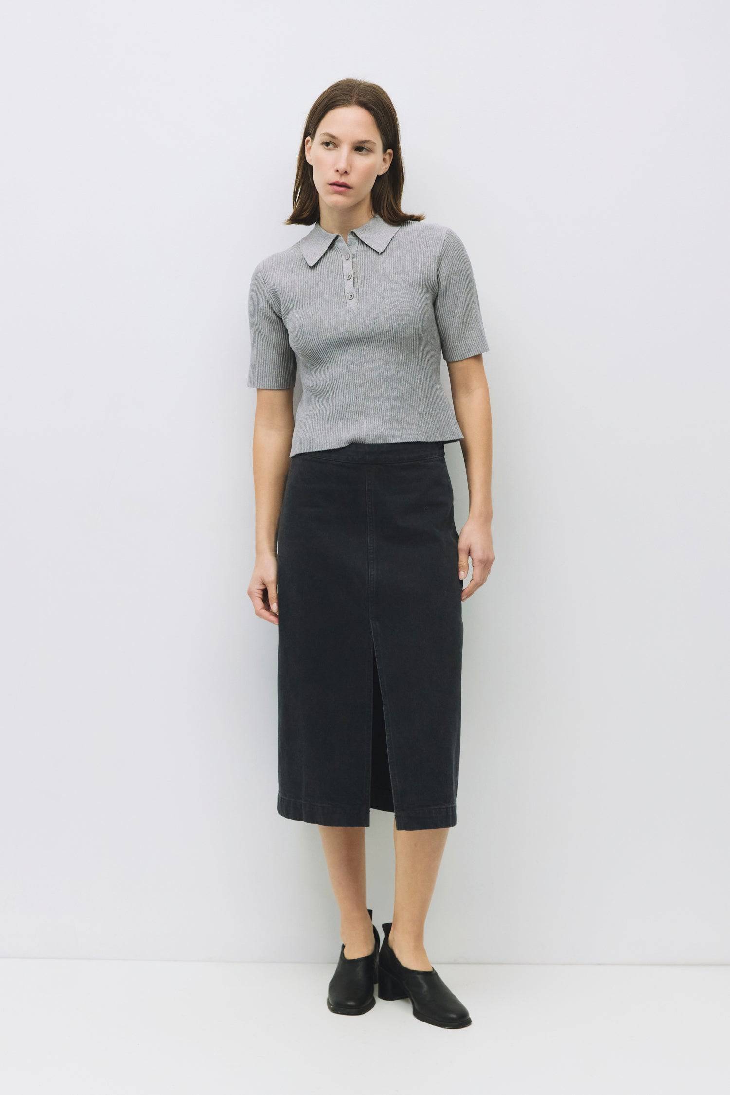 8954057490653, The Marina Top, Tops, Mod Ref, Black,Casual,cf-size-l,cf-size-m,cf-size-s,cf-size-xl,cf-vendor-all-row,Collar,collared,Collared Top,Comfortable,Cream,Crew Neckline,Everyday,Form Fitting,Grey,Layers,Lightweight,Minimal,new,Rib Knit,Ribbed,Ribbed Top,Spring,Trendy,Women's, Information The Marina Top features a chic collared neckline with a mid-front placket and rich ribbed knitting for added texture. With its mid-bicep sleeve length, it’s a versatile piece that’s easy to dress up or wear casual