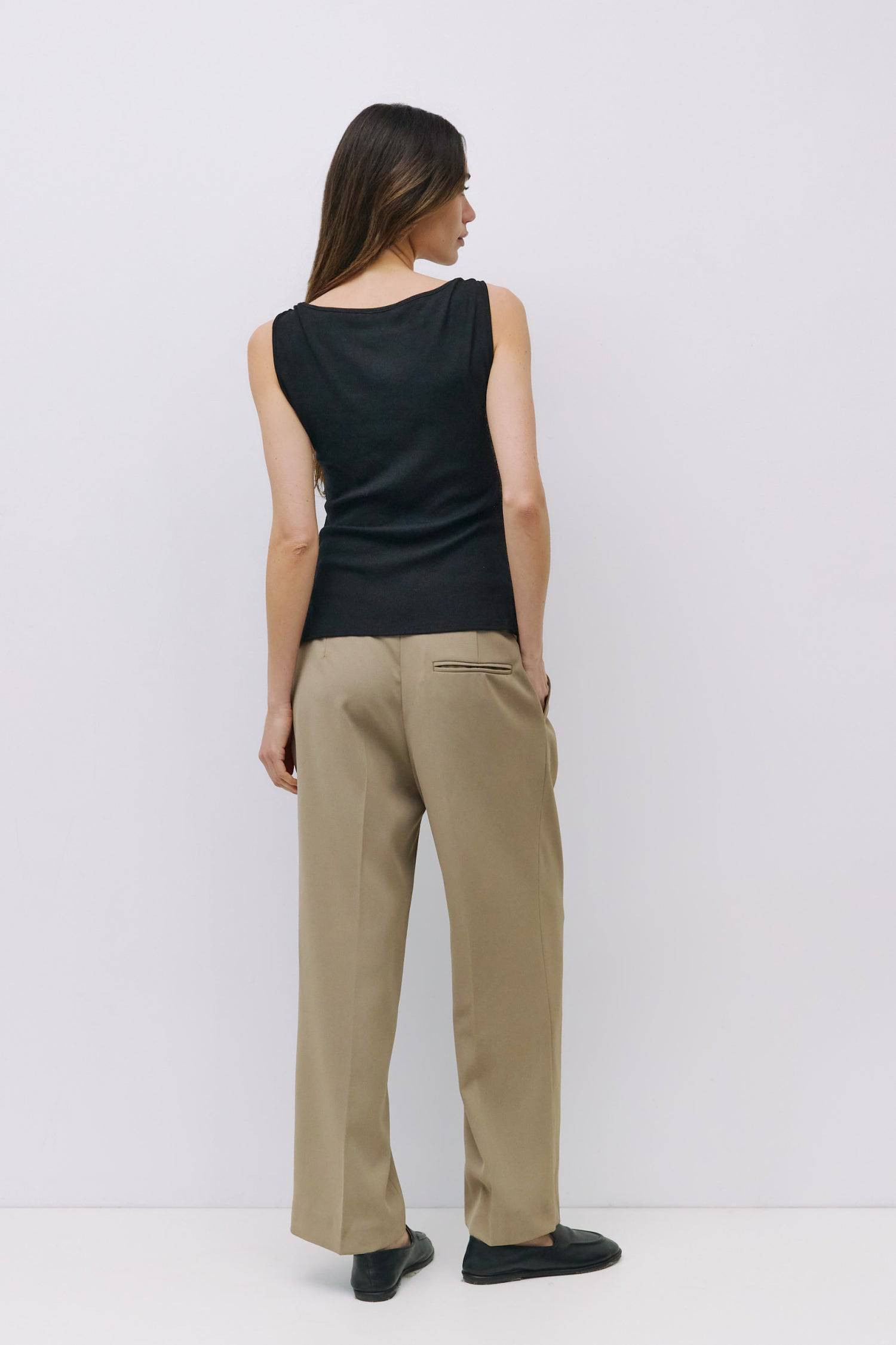 9024056262877, The Regina Top, Tops, Mod Ref, Cap Sleeve,Casual,cf-color-black,cf-size-l,cf-size-m,cf-size-s,cf-size-xl,cf-size-xs,cf-vendor-mod-ref,cinched,Cinched Waist,Comfortable,Cotton,Everyday,Grey,Knit,Mod Ref,modref,new,Relaxed,Relaxed Fit,Rib Knit,set,Sets,Sleeveless Top,Soft Knit,Top,Tops,Transitional,Women's,womens top, Information The Regina Top is a ribbed knit tank with a wide boat neckline and a sleek, fitted silhouette. Designed with overlap shoulder seams, side front shirring, and subtle si