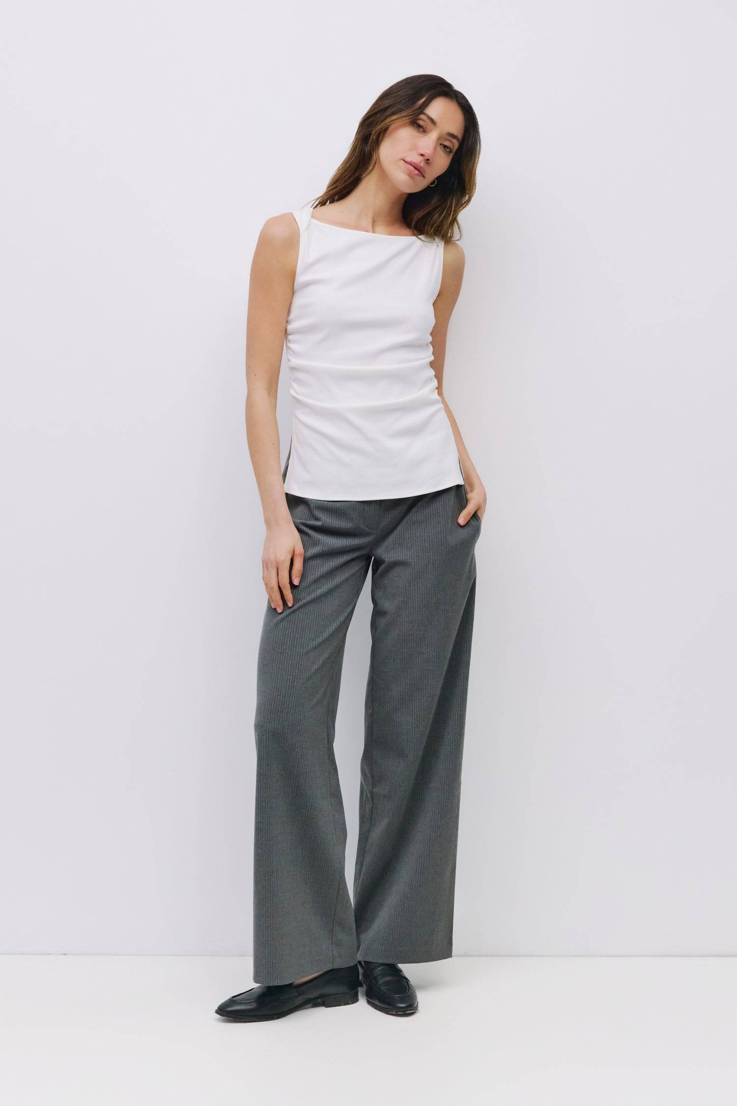 9024056262877, The Regina Top, Tops, Mod Ref, Cap Sleeve,Casual,cf-color-black,cf-size-l,cf-size-m,cf-size-s,cf-size-xl,cf-size-xs,cf-vendor-mod-ref,cinched,Cinched Waist,Comfortable,Cotton,Everyday,Grey,Knit,Mod Ref,modref,new,Relaxed,Relaxed Fit,Rib Knit,set,Sets,Sleeveless Top,Soft Knit,Top,Tops,Transitional,Women's,womens top, Information The Regina Top is a ribbed knit tank with a wide boat neckline and a sleek, fitted silhouette. Designed with overlap shoulder seams, side front shirring, and subtle si