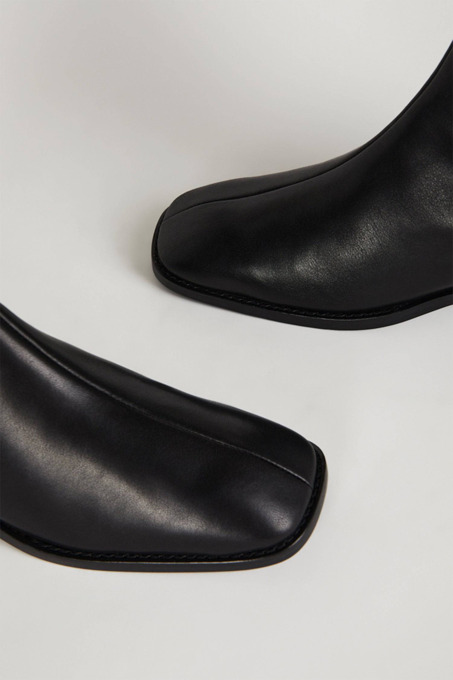 8180715618525, Tour Leather Boot, Shoes, Intentionally Blank, All Row,Basic,Basics,Black,block heel,boot,cf-size-6,cf-size-7,cf-size-8,cf-size-9,cf-vendor-intentionally-blank,Everyday,final-sale,finalsale,Mod Ref,sale,shoes,square toe,Transitional,Women's,women's shoes, Information The vibe of our number one CONTOUR boot, this lower heeled version is just as chic, but more streamlined, and perfect for all day city errands and life. Details Leather lining Memory foam footbed Heel 1.25 inches True to size Wom