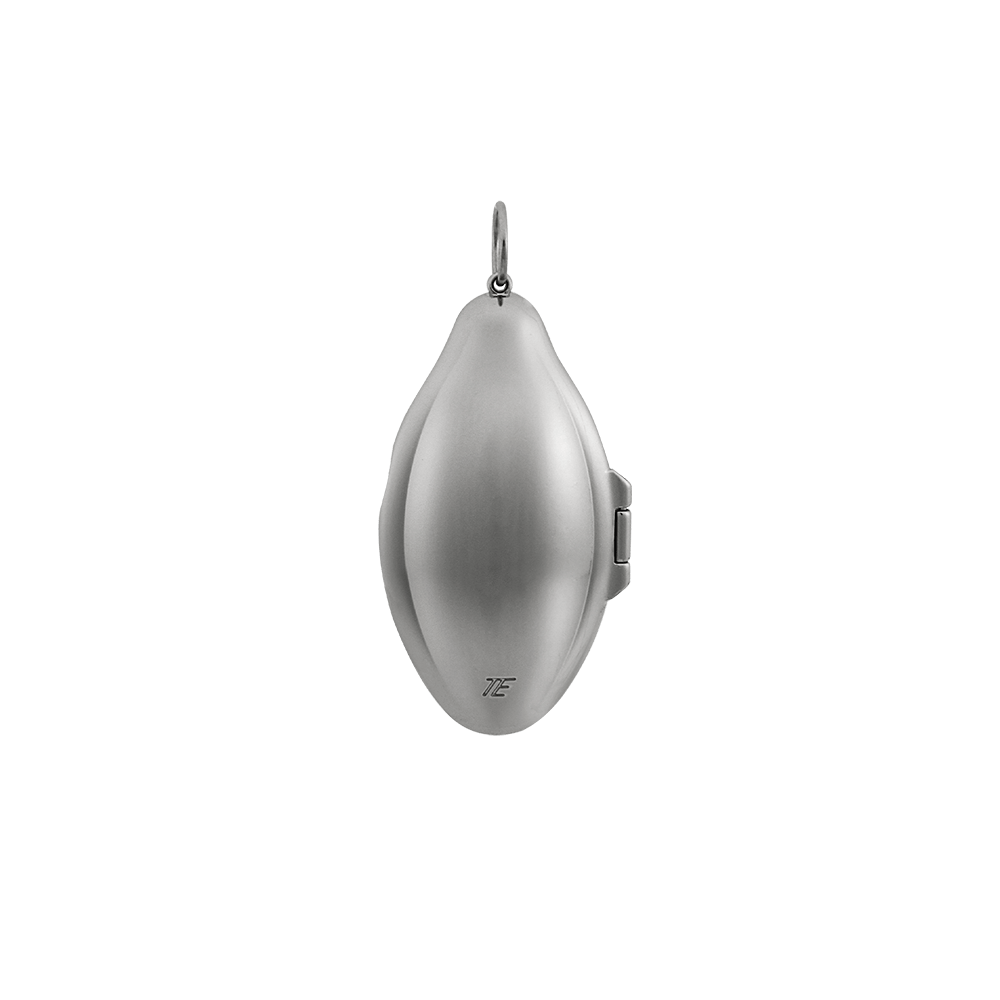 8987274150109, The Seed Case Pendant, Accessories, The Empathist, accessories,empathist,keychain,keyring,pendant, The Seed Case Pendant is mini case that resembles the shape of pumpkin seeds. It can be opened and closed by a magnet inserted inside. May be used as a pendant to carry small items. The O-ring on the top can be combined with the seed key ring.The case is made of zinc alloy and has high corrosion resistance, finished with glossy nickel plating. Details: MATERIALS : Nickel Plated Zinc Alloy ORIGIN