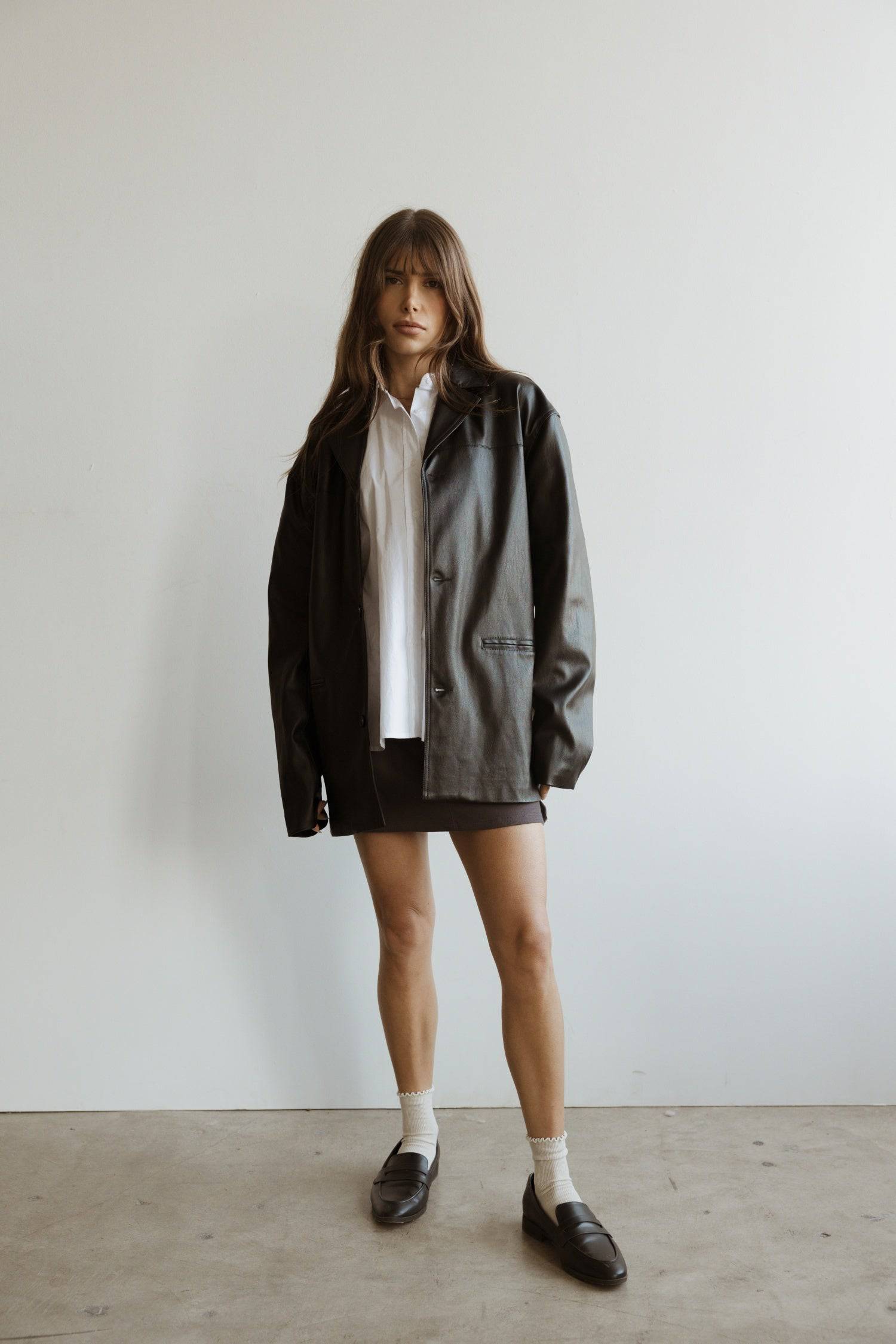 7964139290845, The Camren Jacket, Outerwear, All Row, All Row,allrow,Back Detail,cf-color-black,cf-color-olive,cf-size-l,cf-vendor-all-row,Coat,common,common market,Cotton,Detail,Faux Leather,genderless,Leather,mens,mens shirt,minimalist,new,Olive,Oversized,Pleather,Polyester,Semi-Formal,Spring,statement,statement piece,tencel,Unisex,vegan leather,versatile,Womens,womens top, Information The Camren Jacket is a unisex faux leather jacket in a boxy silhouette. It features a back yoke, side patch pockets, and