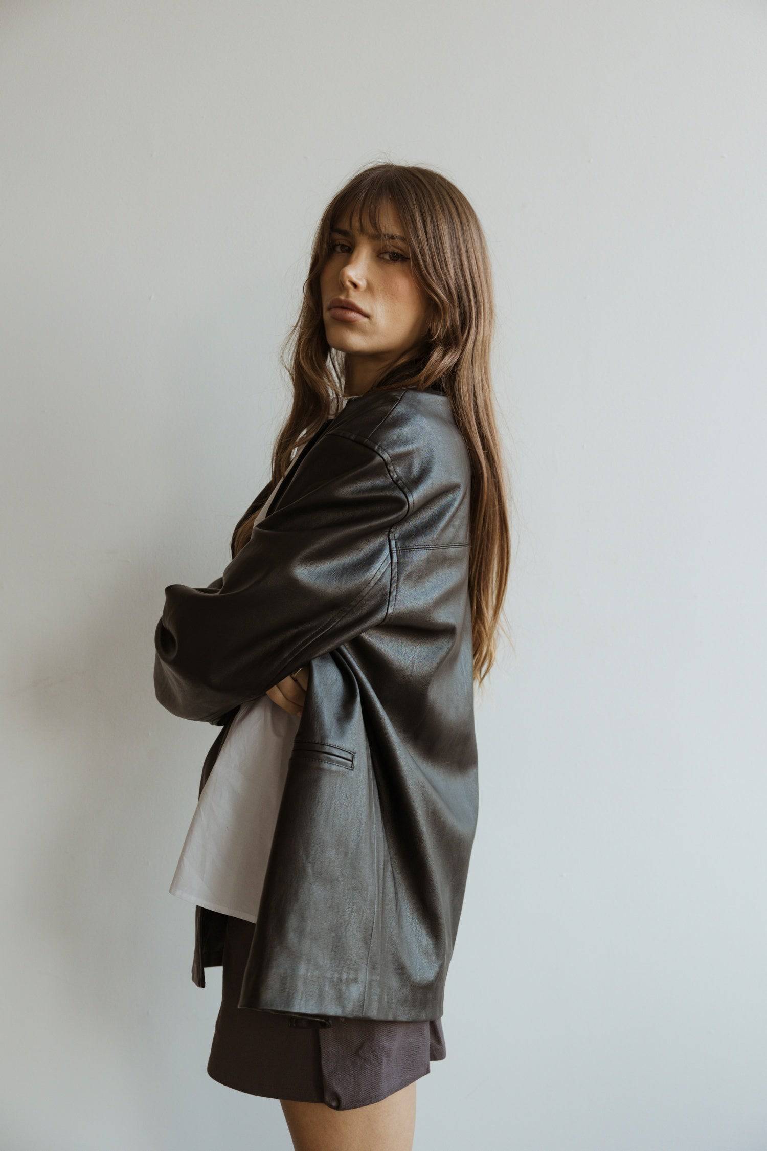 7964139290845, The Camren Jacket, Outerwear, All Row, All Row,allrow,Back Detail,cf-color-black,cf-color-olive,cf-size-l,cf-vendor-all-row,Coat,common,common market,Cotton,Detail,Faux Leather,genderless,Leather,mens,mens shirt,minimalist,new,Olive,Oversized,Pleather,Polyester,Semi-Formal,Spring,statement,statement piece,tencel,Unisex,vegan leather,versatile,Womens,womens top, Information The Camren Jacket is a unisex faux leather jacket in a boxy silhouette. It features a back yoke, side patch pockets, and