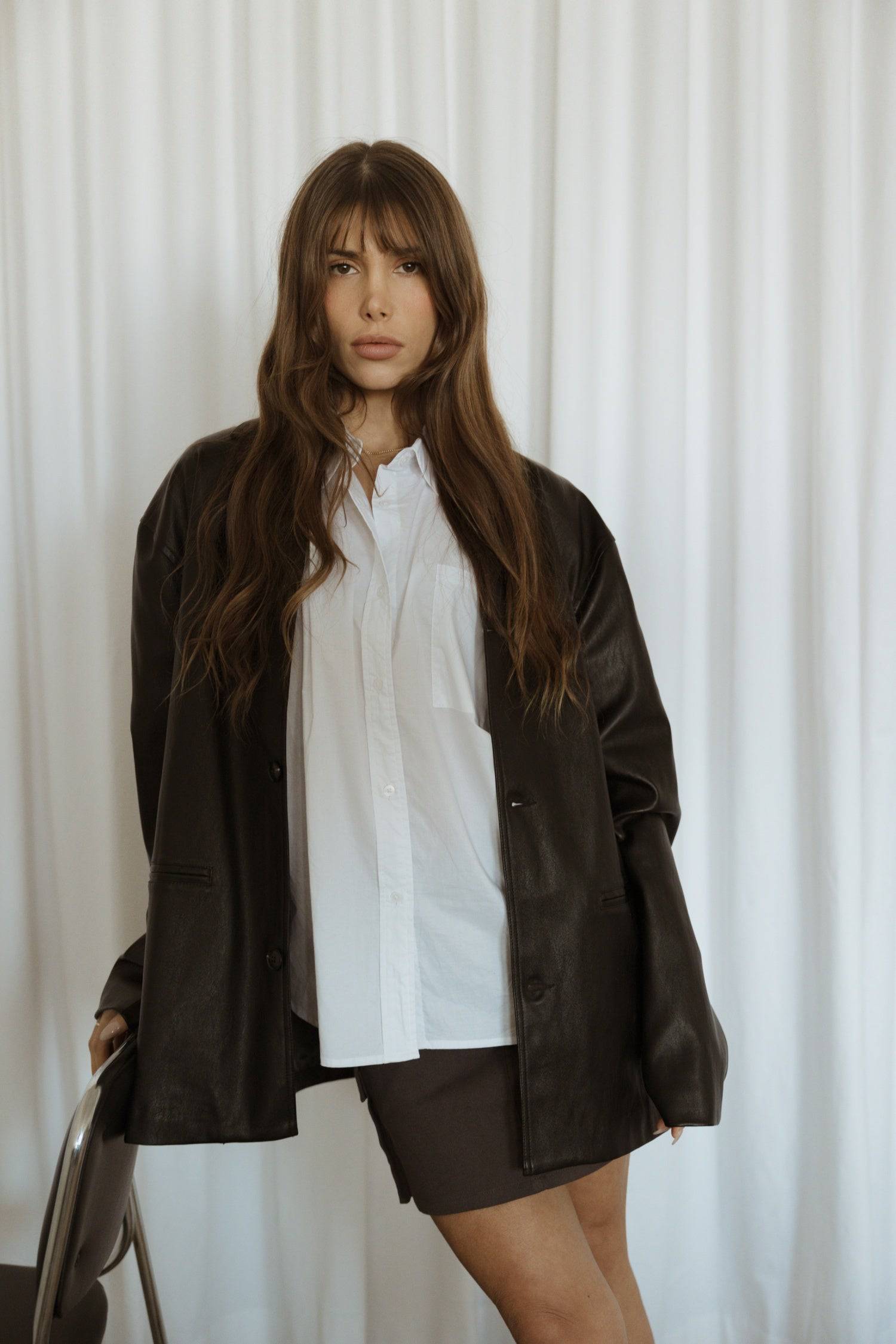 7964139290845, The Camren Jacket, Outerwear, All Row, All Row,allrow,Back Detail,cf-color-black,cf-color-olive,cf-size-l,cf-vendor-all-row,Coat,common,common market,Cotton,Detail,Faux Leather,genderless,Leather,mens,mens shirt,minimalist,new,Olive,Oversized,Pleather,Polyester,Semi-Formal,Spring,statement,statement piece,tencel,Unisex,vegan leather,versatile,Womens,womens top, Information The Camren Jacket is a unisex faux leather jacket in a boxy silhouette. It features a back yoke, side patch pockets, and