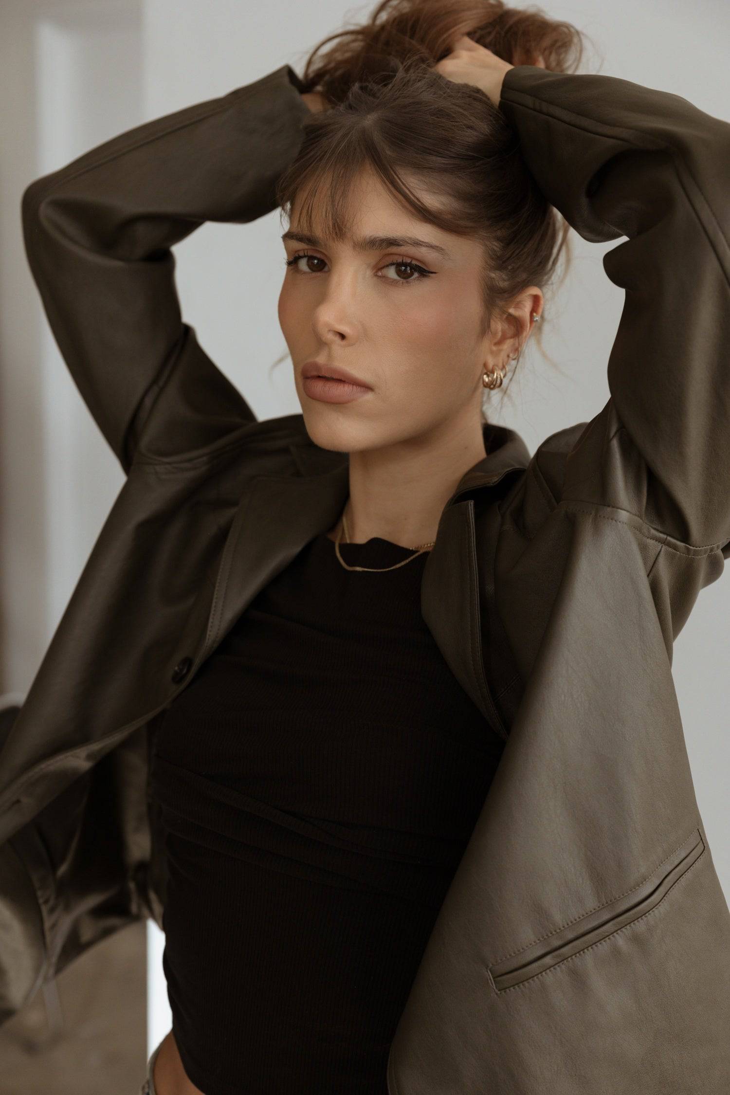 7964139290845, The Camren Jacket, Outerwear, All Row, All Row,allrow,Back Detail,cf-color-black,cf-color-olive,cf-size-l,cf-vendor-all-row,Coat,common,common market,Cotton,Detail,Faux Leather,genderless,Leather,mens,mens shirt,minimalist,new,Olive,Oversized,Pleather,Polyester,Semi-Formal,Spring,statement,statement piece,tencel,Unisex,vegan leather,versatile,Womens,womens top, Information The Camren Jacket is a unisex faux leather jacket in a boxy silhouette. It features a back yoke, side patch pockets, and