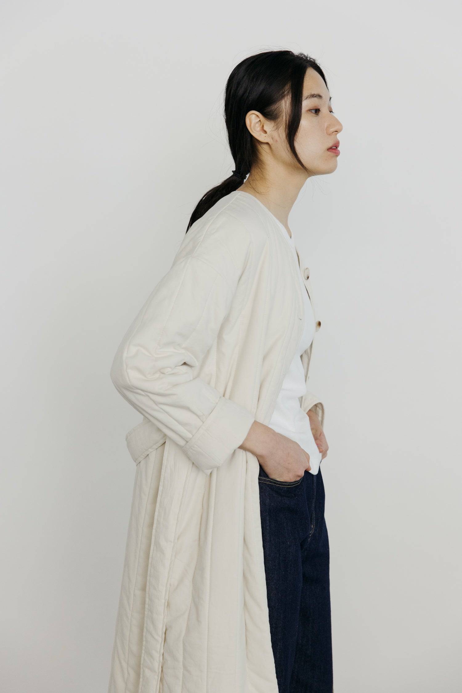 7964146401501, The Cary Coat, Outerwear, All Row, All Row,allrow,Back Detail,cf-color-black,cf-color-cream,cf-size-l,cf-size-m,cf-size-s,cf-vendor-all-row,Coat,Cotton,Cream,Detail,final-sale,finalsale,minimalist,new,Oversized,sale,statement,statement piece,tencel,Womens,womens top, Information Your winter wardrobe won't be complete without this long quilted coat. The Cary Coat is made in an oversized fit and features a classic rounded neckline, a button front closure, patch pockets, an easy below-the-knee l