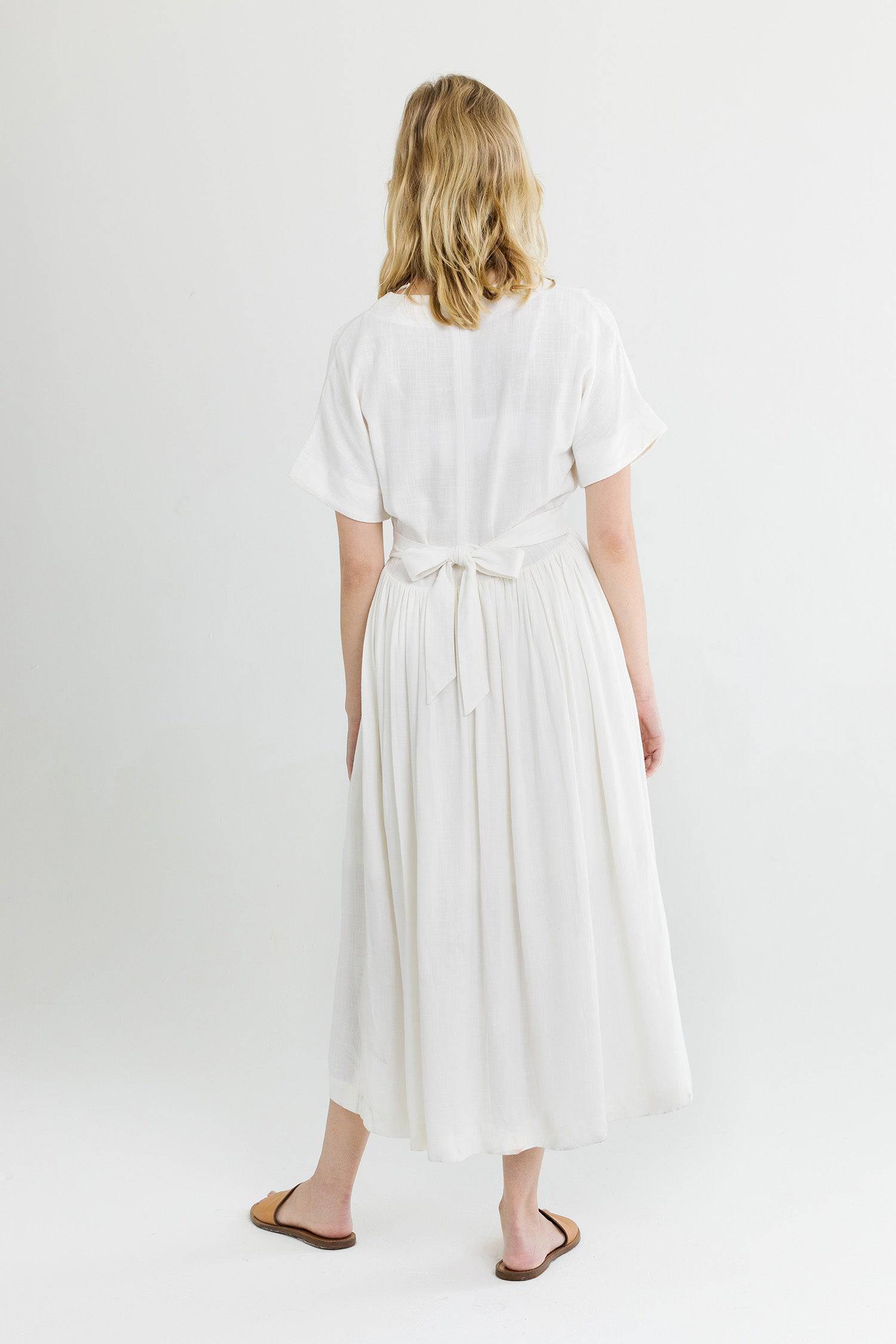 8861270507741, The Palma Dress, Dress, Mod Ref, Belted Tie Waist,Blush,Casual,cf-color-blush,cf-color-tan,cf-color-white,cf-size-l,cf-size-m,cf-size-s,Collar,Detail,Details,Dress,Flow,flowy,Linen,Long Dress,Maxi,maxi dress,Minimal,minimalist,Mod Ref,modref,new,ruched,Soft,Spring,Summer,V neck,V Neckline,Waist Tie,white,Women's,Yellow, Information The Palma Dress is maxi length dress with a v-neckline and waist tie. The piece has feminine touches such as a flutter sleeve and full skirt. Details 70% Linen, 30