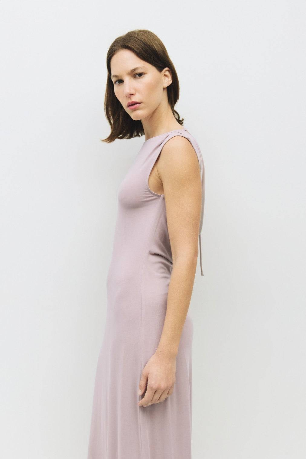 8982639444189, The Benson Dress, Dress, Mod Ref, Black,Casual,cf-color-black,cf-color-red,cf-color-white,cf-size-l,cf-vendor-all-row,collared,Comfort,Comfortable,Feminine,full skirt,Midi,Midi Dress,midi length,new,Red,Sleeveless,Sleeveless Dress,Spring,versatile,white,Womens, Information The Benson Dress is a sleeveless, fitted maxi dress made from a buttery soft modal blend, featuring a wide neck and a flattering slight flare at the bottom hem. With a stunning cowl back detail and adjustable self-tie strap