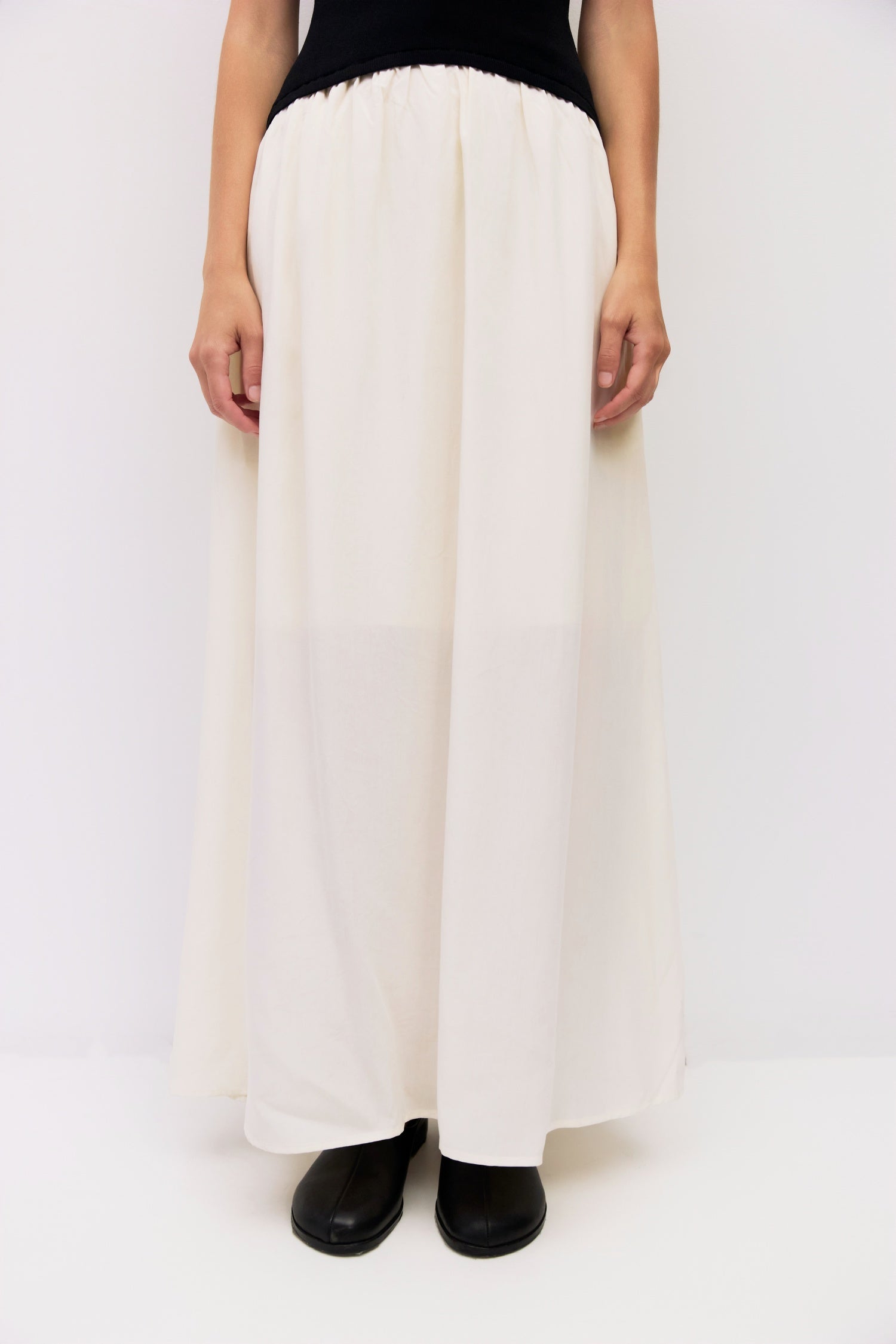 9061529747677, The Stefani Dress, Dress, All Row, cf-size-l,cf-vendor-all-row,collared,Comfort,Comfortable,Feminine,merrow edge,mini,new,Spring,strapless,Summer,textured,Textured Fabric,Transitional,versatile,Womens, Information The Stefani Dress pairs a fitted, strapless knit bodice with a lightweight, shirred midi skirt for a flattering two-tone silhouette. Side pockets add a practical touch to this effortlessly chic piece. Details Self: 100% Recycled Polyester, Contrast: 65% Viscose, 35% Nylon Strapless 