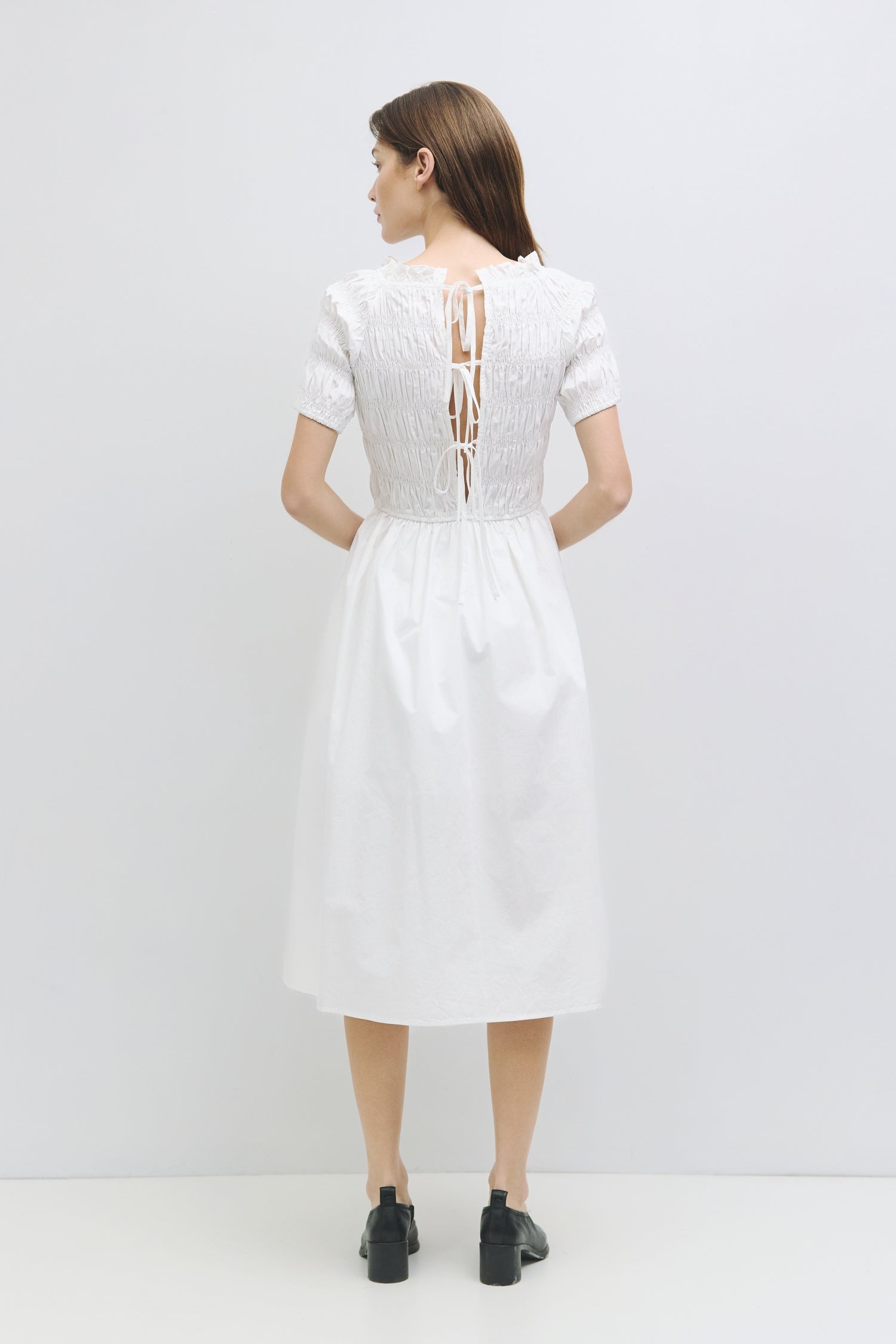 9045699035357, The Roland Dress, Dress, All Row, adjustable ties,Black,Casual,cf-color-black,cf-color-cream,cf-size-l,cf-vendor-all-row,Comfort,Comfortable,Cream,Dress,dressy,Elastic Waist,Feminine,fit and flare,full skirt,Light Blue,Midi,Midi Dress,midi length,new,open back,Semi-Formal,Shirred Bodice,Spring,Summer,Transitional,versatile,Womens, Information The Roland Dress is a shirred midi dress featuring a fit-and-flare design with an open back and tie detail. The midi length and attached lining skirt en