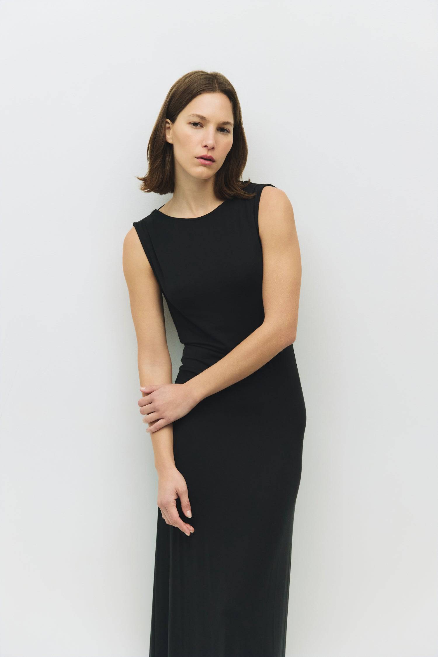 8982639444189, The Benson Dress, Dress, Mod Ref, Black,Casual,cf-color-black,cf-color-red,cf-color-white,cf-size-l,cf-vendor-all-row,collared,Comfort,Comfortable,Feminine,full skirt,Midi,Midi Dress,midi length,new,Red,Sleeveless,Sleeveless Dress,Spring,versatile,white,Womens, Information The Benson Dress is a sleeveless, fitted maxi dress made from a buttery soft modal blend, featuring a wide neck and a flattering slight flare at the bottom hem. With a stunning cowl back detail and adjustable self-tie strap