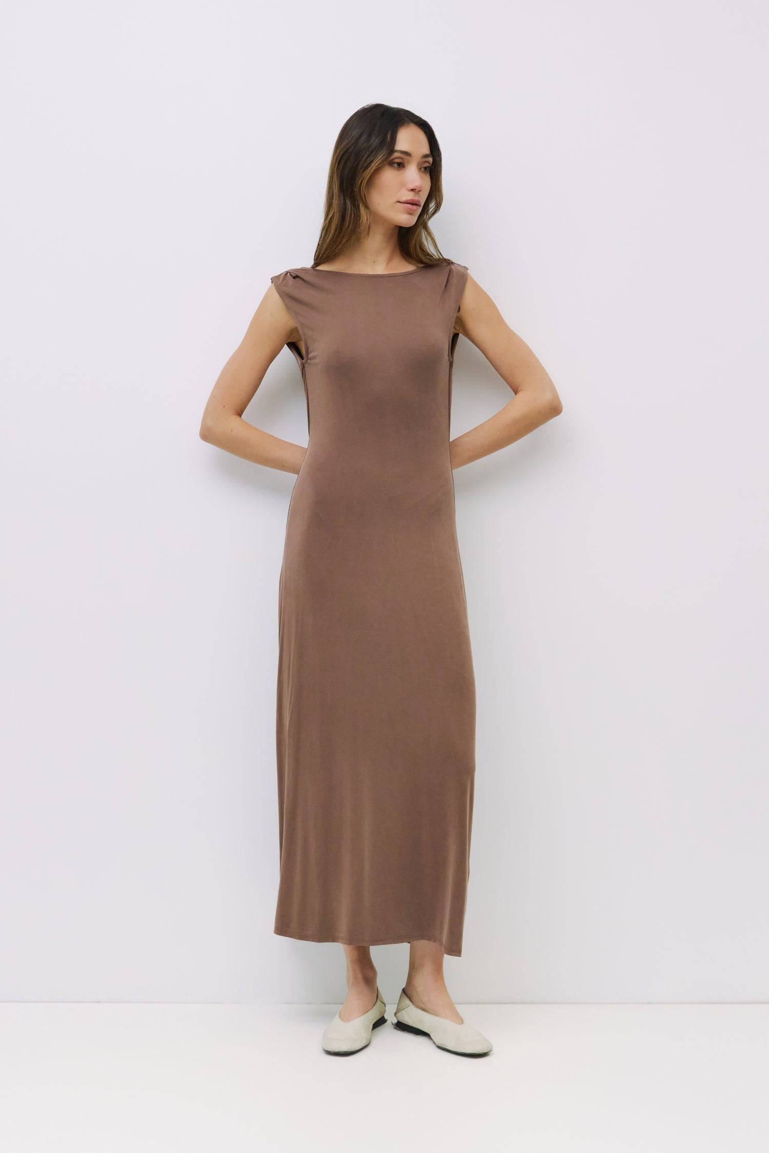 8982639444189, The Benson Dress, Dress, Mod Ref, Black,Casual,cf-color-black,cf-color-red,cf-color-white,cf-size-l,cf-vendor-all-row,collared,Comfort,Comfortable,Feminine,full skirt,Midi,Midi Dress,midi length,new,Red,Sleeveless,Sleeveless Dress,Spring,versatile,white,Womens, Information The Benson Dress is a sleeveless, fitted maxi dress made from a buttery soft modal blend, featuring a wide neck and a flattering slight flare at the bottom hem. With a stunning cowl back detail and adjustable self-tie strap