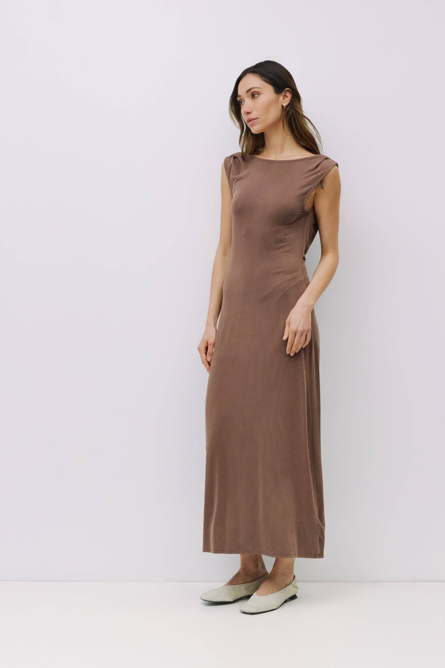 8982639444189, The Benson Dress, Dress, Mod Ref, Black,Casual,cf-color-black,cf-color-red,cf-color-white,cf-size-l,cf-vendor-all-row,collared,Comfort,Comfortable,Feminine,full skirt,Midi,Midi Dress,midi length,new,Red,Sleeveless,Sleeveless Dress,Spring,versatile,white,Womens, Information The Benson Dress is a sleeveless, fitted maxi dress made from a buttery soft modal blend, featuring a wide neck and a flattering slight flare at the bottom hem. With a stunning cowl back detail and adjustable self-tie strap