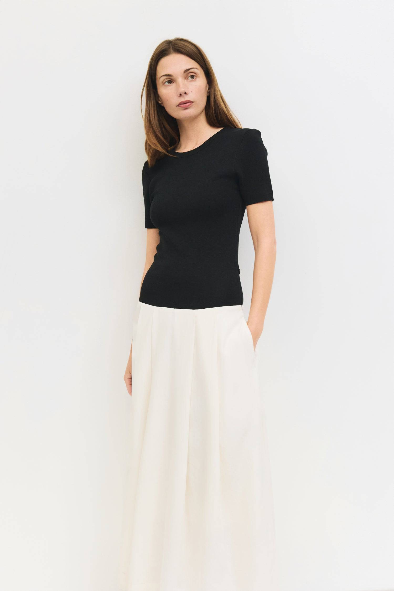9065342173405, The Geena Dress, Dress, Mod Ref, Black,Casual,cf-color-black,cf-color-khaki,cf-color-white,cf-size-l,cf-size-m,cf-size-s,cf-vendor-mod-ref,Cinched Waist,Color Block,Comfortable,corset,Dress,dressy,Form Fitting,Long Dress,maxi dress,Mid Length Dress,Midi,Midi Dress,midi length,new,Pleated,pleated skirt,pleating,Pleats,Pocket,Pockets,Relaxed Fit,side pockets,Spring,square,Summer,white,womens, Information The Geena Dress features a crew neck and short sleeves with a form-fitting knit top that fl