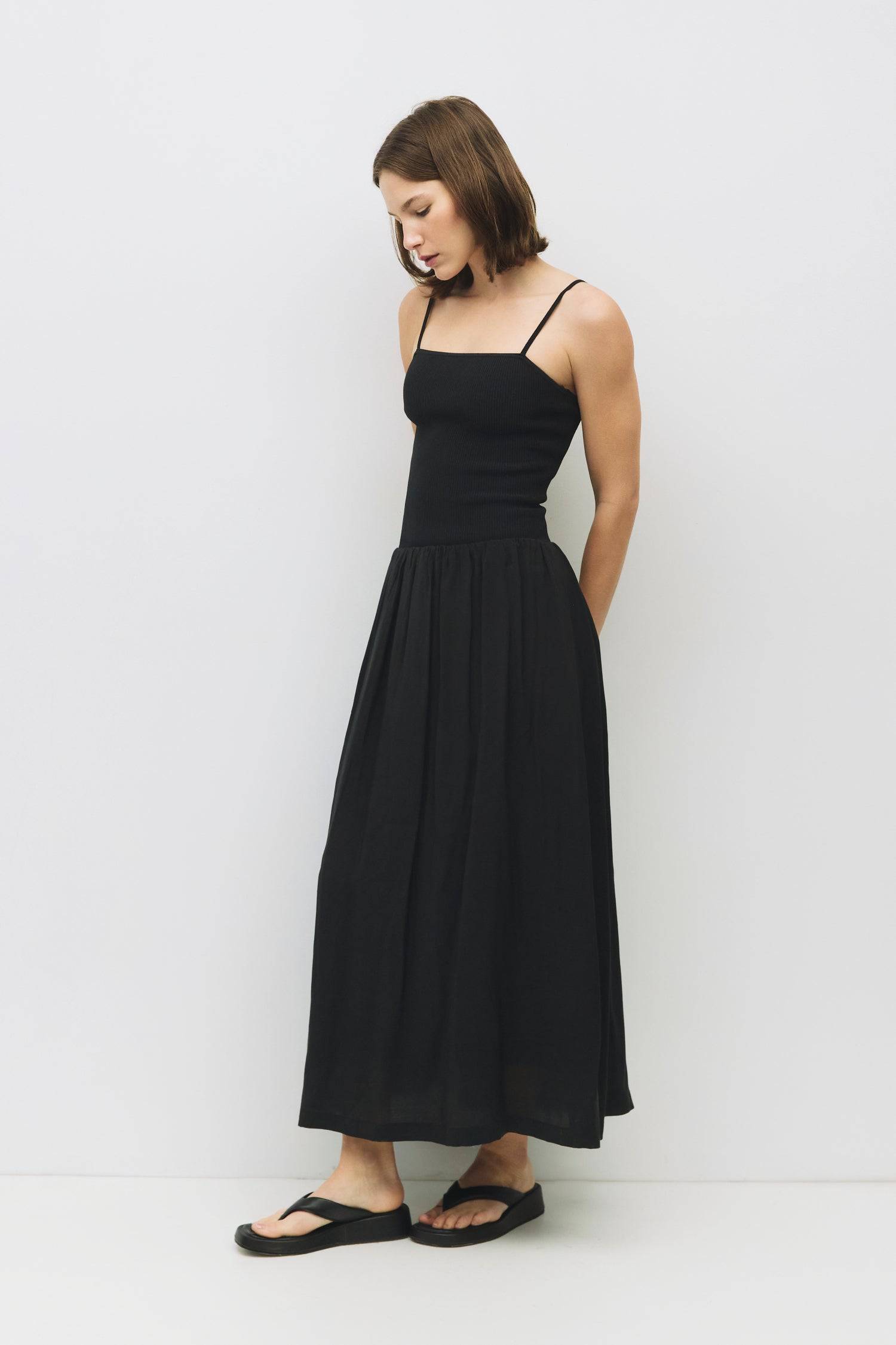 8983746511069, The Hudson Dress, Dress, Mod Ref, Black,Casual,cf-color-black,cf-color-red,cf-color-white,cf-size-l,cf-vendor-all-row,collared,Comfort,Comfortable,Feminine,full skirt,Midi,Midi Dress,midi length,new,Red,Sleeveless,Sleeveless Dress,Spring,versatile,white,Womens, Information The Hudson Dress is a flattering midi tube dress with a ribbed knit top and adjustable straps. The fully lined woven skirt adds a touch of sophistication, making it a go-to piece that transitions seamlessly from day to nigh