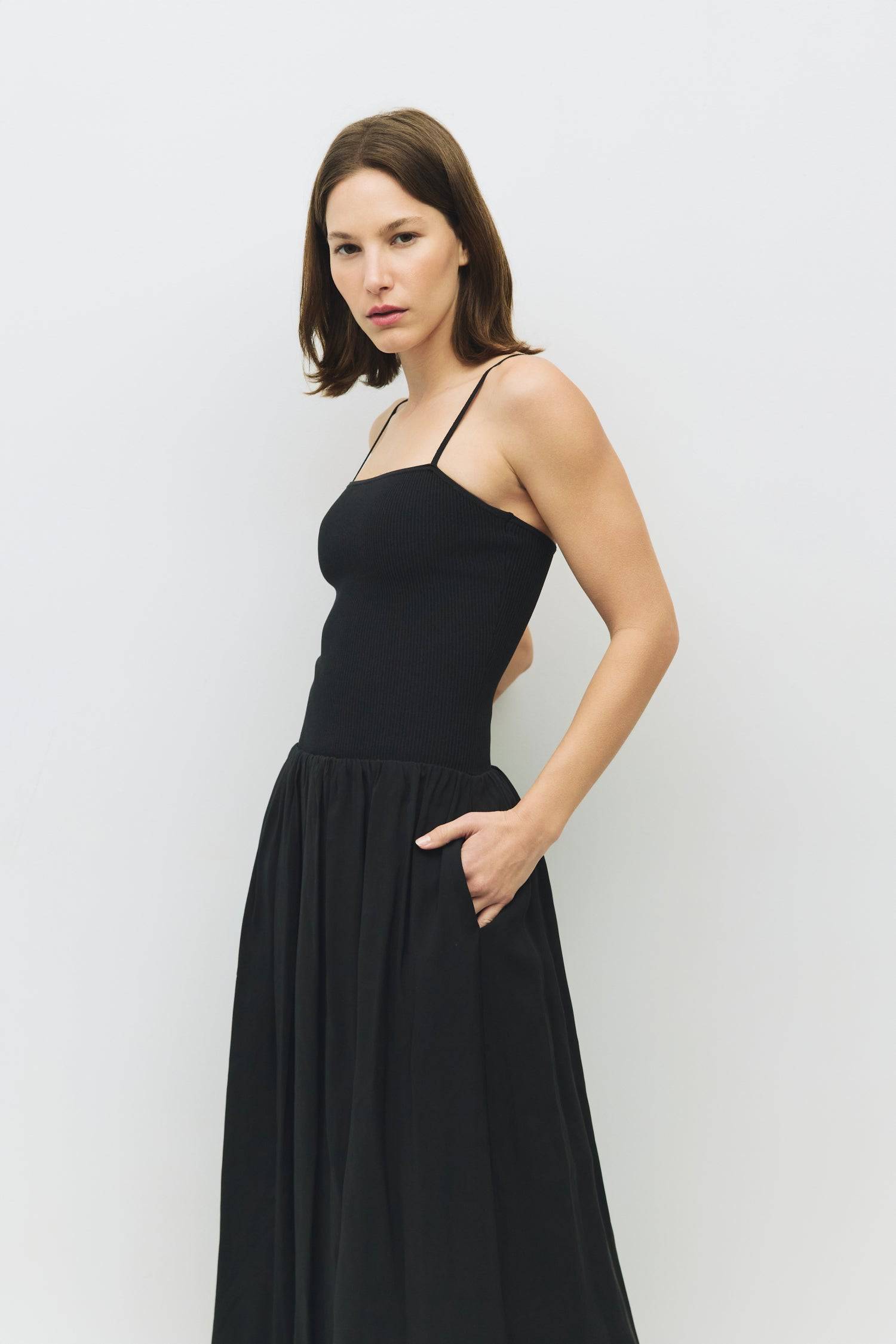 8983746511069, The Hudson Dress, Dress, Mod Ref, Black,Casual,cf-color-black,cf-color-red,cf-color-white,cf-size-l,cf-vendor-all-row,collared,Comfort,Comfortable,Feminine,full skirt,Midi,Midi Dress,midi length,new,Red,Sleeveless,Sleeveless Dress,Spring,versatile,white,Womens, Information The Hudson Dress is a flattering midi tube dress with a ribbed knit top and adjustable straps. The fully lined woven skirt adds a touch of sophistication, making it a go-to piece that transitions seamlessly from day to nigh