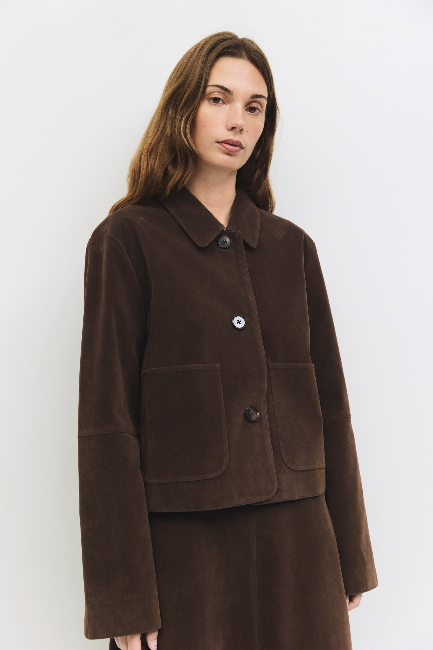 9084505620701, The Eryn Jacket, Outerwear, All Row, All Row,allrow,Back Detail,Black,Casual,cf-color-black,cf-size-l,cf-size-m,cf-vendor-all-row,Coat,Comfortable,Cropped,cropped hemline,Detail,Everyday,Faux Leather,genderless,Jacket,Leather,leather jacket,Minimal,minimalist,new,Outerwear,Pleather,Polyester,Semi-Formal,Spring,statement,statement piece,Transitional,vegan leather,versatile,Womens, Information The Eryn Jacket is a cropped suede piece with a relaxed fit, featuring a classic collar and front butt