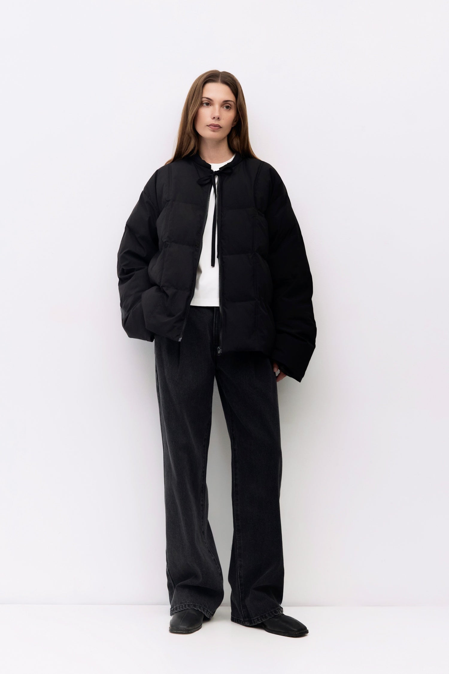 9084496347357, The Mila Jacket, Outerwear, All Row, All Row,allrow,Back Detail,Black,Casual,cf-color-black,cf-size-l,cf-size-m,cf-vendor-all-row,Coat,Comfortable,Cropped,cropped hemline,Detail,Everyday,Faux Leather,genderless,Jacket,Leather,leather jacket,Minimal,minimalist,new,Outerwear,Pleather,Polyester,Semi-Formal,Spring,statement,statement piece,Transitional,vegan leather,versatile,Womens,womens top, Information The Mila Jacket is a fully lined puffer style with quilted padding for added warmth. Design
