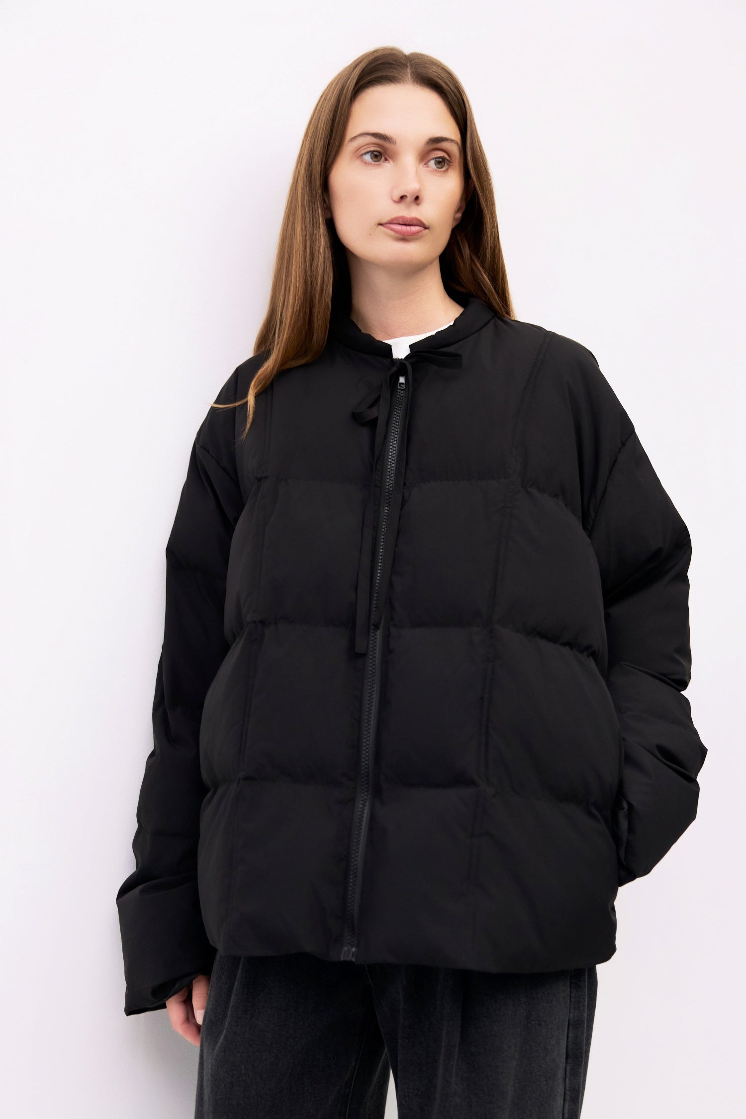 9084496347357, The Mila Jacket, Outerwear, All Row, All Row,allrow,Back Detail,Black,Casual,cf-color-black,cf-size-l,cf-size-m,cf-vendor-all-row,Coat,Comfortable,Cropped,cropped hemline,Detail,Everyday,Faux Leather,genderless,Jacket,Leather,leather jacket,Minimal,minimalist,new,Outerwear,Pleather,Polyester,Semi-Formal,Spring,statement,statement piece,Transitional,vegan leather,versatile,Womens,womens top, Information The Mila Jacket is a fully lined puffer style with quilted padding for added warmth. Design