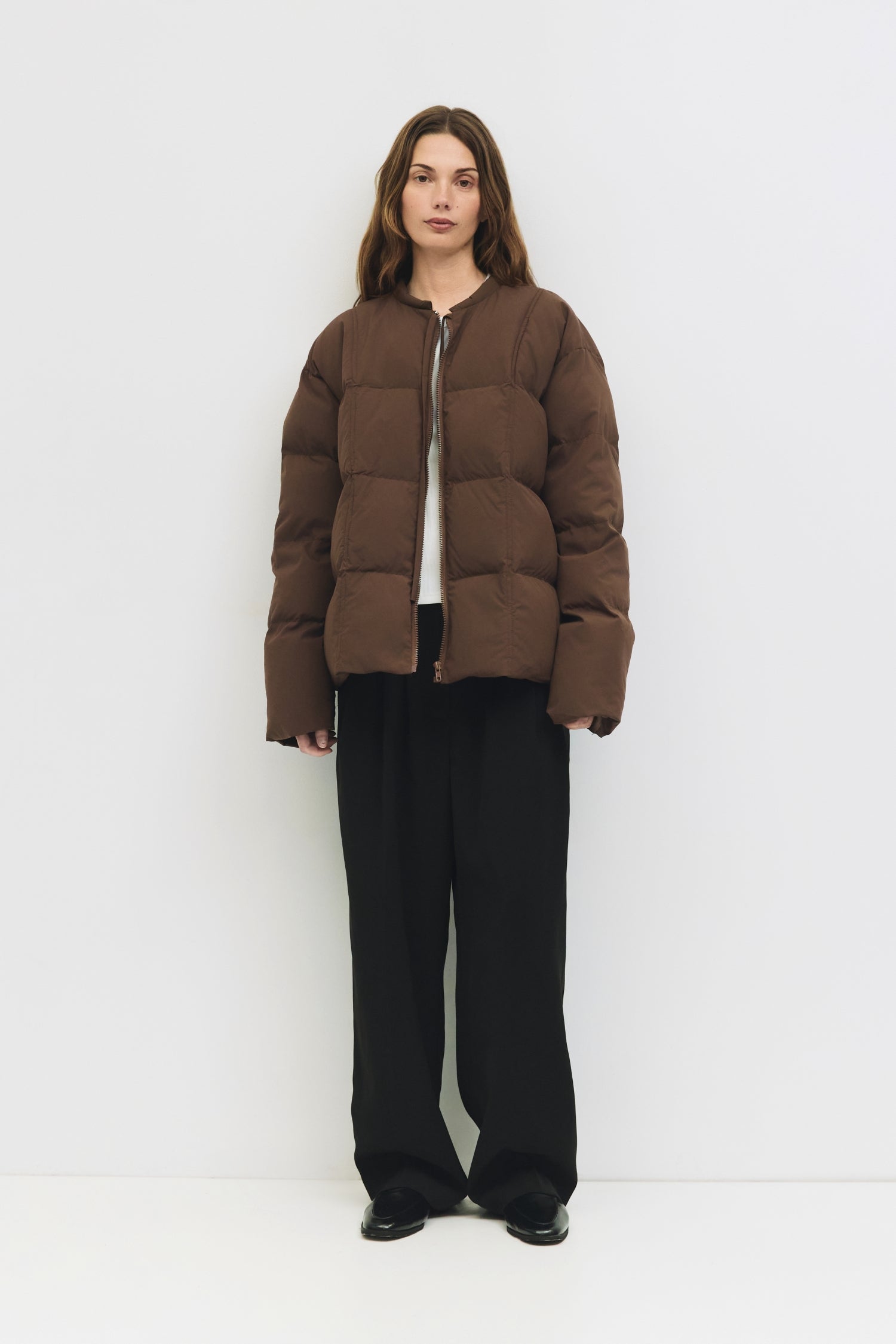 9084496347357, The Mila Jacket, Outerwear, All Row, All Row,allrow,Back Detail,Black,Casual,cf-color-black,cf-size-l,cf-size-m,cf-vendor-all-row,Coat,Comfortable,Cropped,cropped hemline,Detail,Everyday,Faux Leather,genderless,Jacket,Leather,leather jacket,Minimal,minimalist,new,Outerwear,Pleather,Polyester,Semi-Formal,Spring,statement,statement piece,Transitional,vegan leather,versatile,Womens,womens top, Information The Mila Jacket is a fully lined puffer style with quilted padding for added warmth. Design