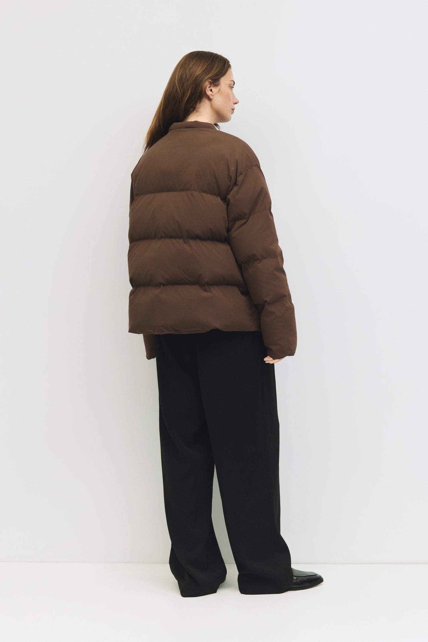 9084496347357, The Mila Jacket, Outerwear, All Row, All Row,allrow,Back Detail,Black,Casual,cf-color-black,cf-size-l,cf-size-m,cf-vendor-all-row,Coat,Comfortable,Cropped,cropped hemline,Detail,Everyday,Faux Leather,genderless,Jacket,Leather,leather jacket,Minimal,minimalist,new,Outerwear,Pleather,Polyester,Semi-Formal,Spring,statement,statement piece,Transitional,vegan leather,versatile,Womens,womens top, Information The Mila Jacket is a fully lined puffer style with quilted padding for added warmth. Design