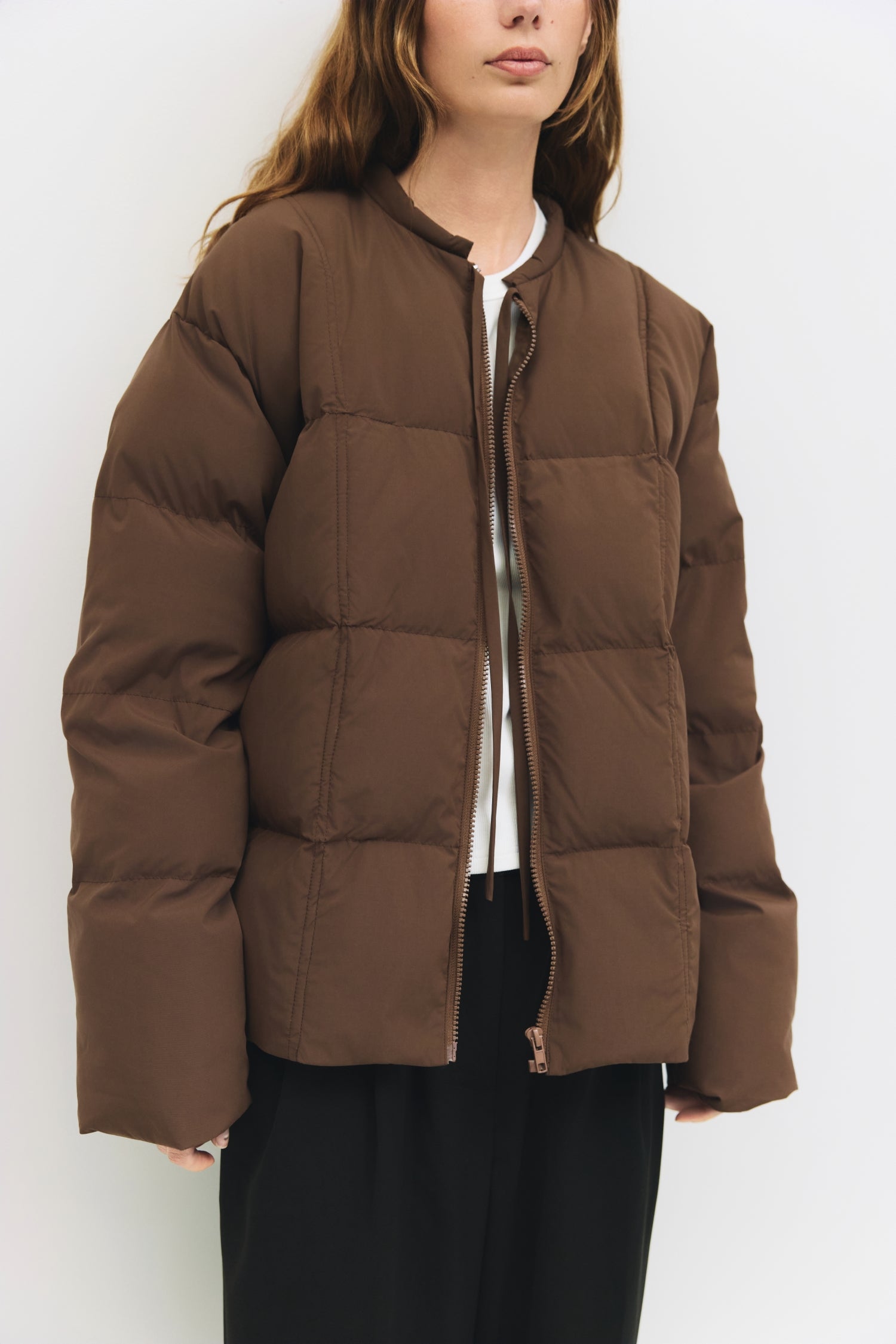 9084496347357, The Mila Jacket, Outerwear, All Row, All Row,allrow,Back Detail,Black,Casual,cf-color-black,cf-size-l,cf-size-m,cf-vendor-all-row,Coat,Comfortable,Cropped,cropped hemline,Detail,Everyday,Faux Leather,genderless,Jacket,Leather,leather jacket,Minimal,minimalist,new,Outerwear,Pleather,Polyester,Semi-Formal,Spring,statement,statement piece,Transitional,vegan leather,versatile,Womens,womens top, Information The Mila Jacket is a fully lined puffer style with quilted padding for added warmth. Design