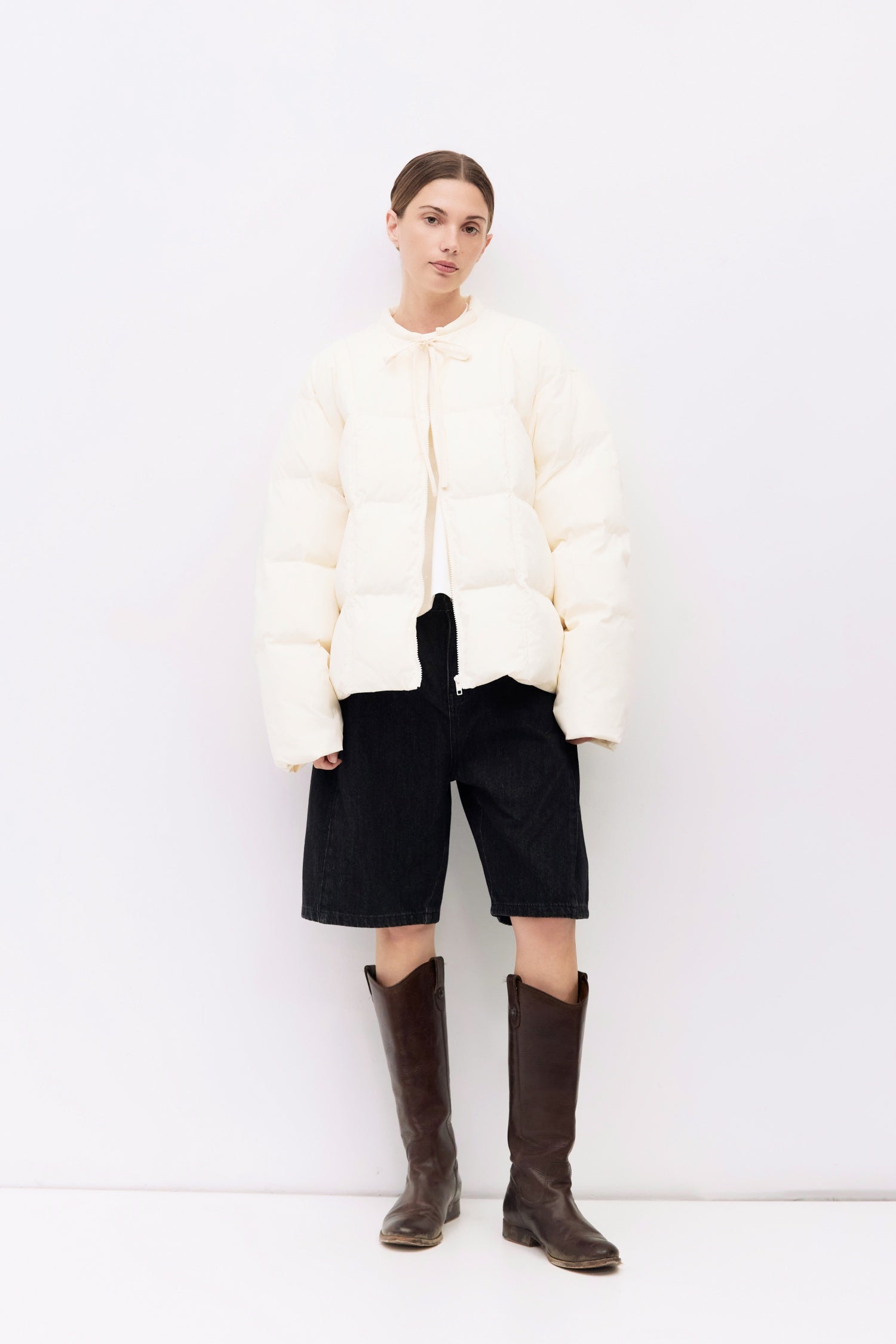 9084496347357, The Mila Jacket, Outerwear, All Row, All Row,allrow,Back Detail,Black,Casual,cf-color-black,cf-size-l,cf-size-m,cf-vendor-all-row,Coat,Comfortable,Cropped,cropped hemline,Detail,Everyday,Faux Leather,genderless,Jacket,Leather,leather jacket,Minimal,minimalist,new,Outerwear,Pleather,Polyester,Semi-Formal,Spring,statement,statement piece,Transitional,vegan leather,versatile,Womens,womens top, Information The Mila Jacket is a fully lined puffer style with quilted padding for added warmth. Design