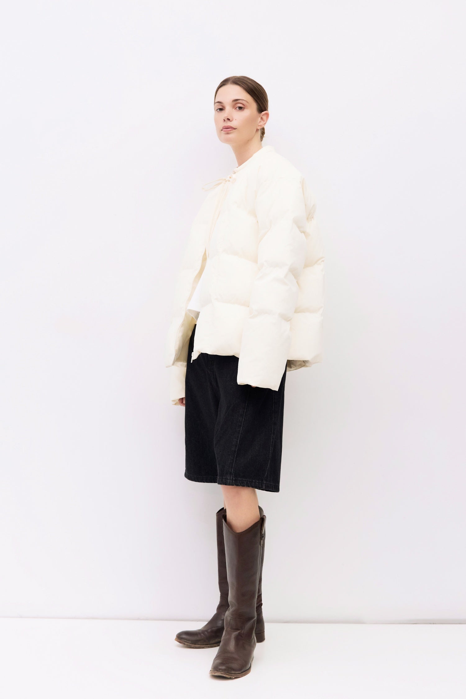 9084496347357, The Mila Jacket, Outerwear, All Row, All Row,allrow,Back Detail,Black,Casual,cf-color-black,cf-size-l,cf-size-m,cf-vendor-all-row,Coat,Comfortable,Cropped,cropped hemline,Detail,Everyday,Faux Leather,genderless,Jacket,Leather,leather jacket,Minimal,minimalist,new,Outerwear,Pleather,Polyester,Semi-Formal,Spring,statement,statement piece,Transitional,vegan leather,versatile,Womens,womens top, Information The Mila Jacket is a fully lined puffer style with quilted padding for added warmth. Design