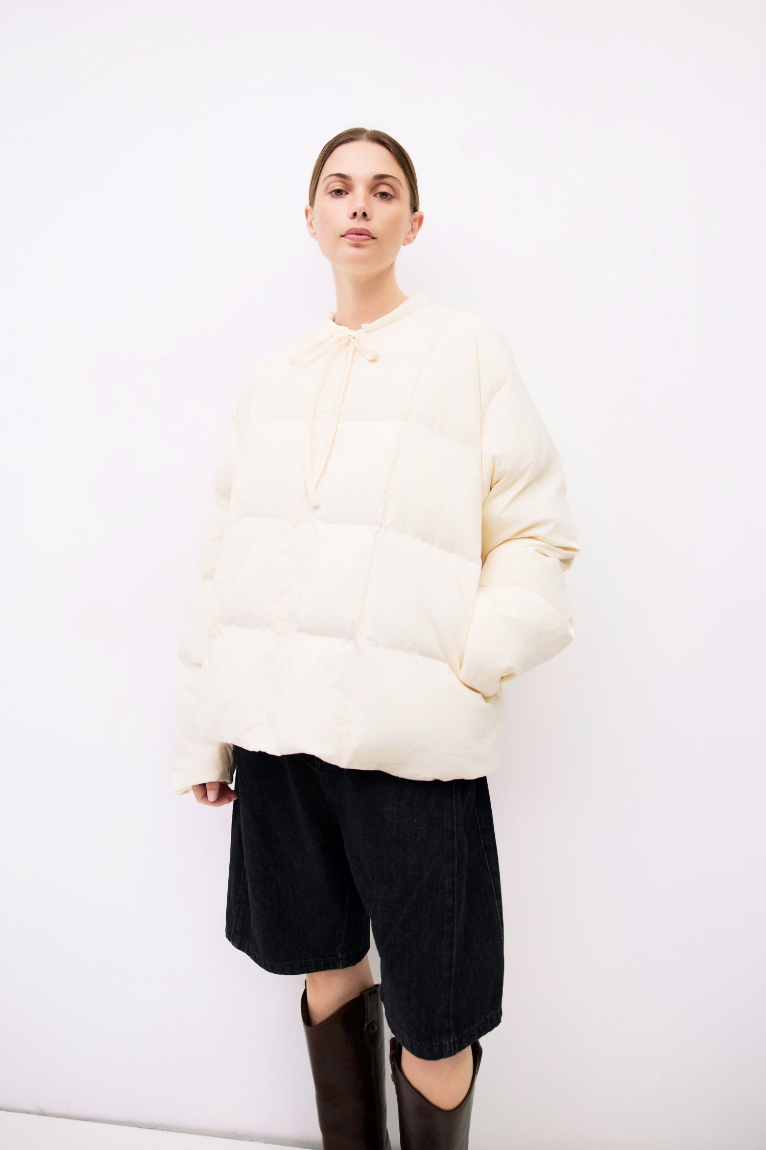 9084496347357, The Mila Jacket, Outerwear, All Row, All Row,allrow,Back Detail,Black,Casual,cf-color-black,cf-size-l,cf-size-m,cf-vendor-all-row,Coat,Comfortable,Cropped,cropped hemline,Detail,Everyday,Faux Leather,genderless,Jacket,Leather,leather jacket,Minimal,minimalist,new,Outerwear,Pleather,Polyester,Semi-Formal,Spring,statement,statement piece,Transitional,vegan leather,versatile,Womens,womens top, Information The Mila Jacket is a fully lined puffer style with quilted padding for added warmth. Design