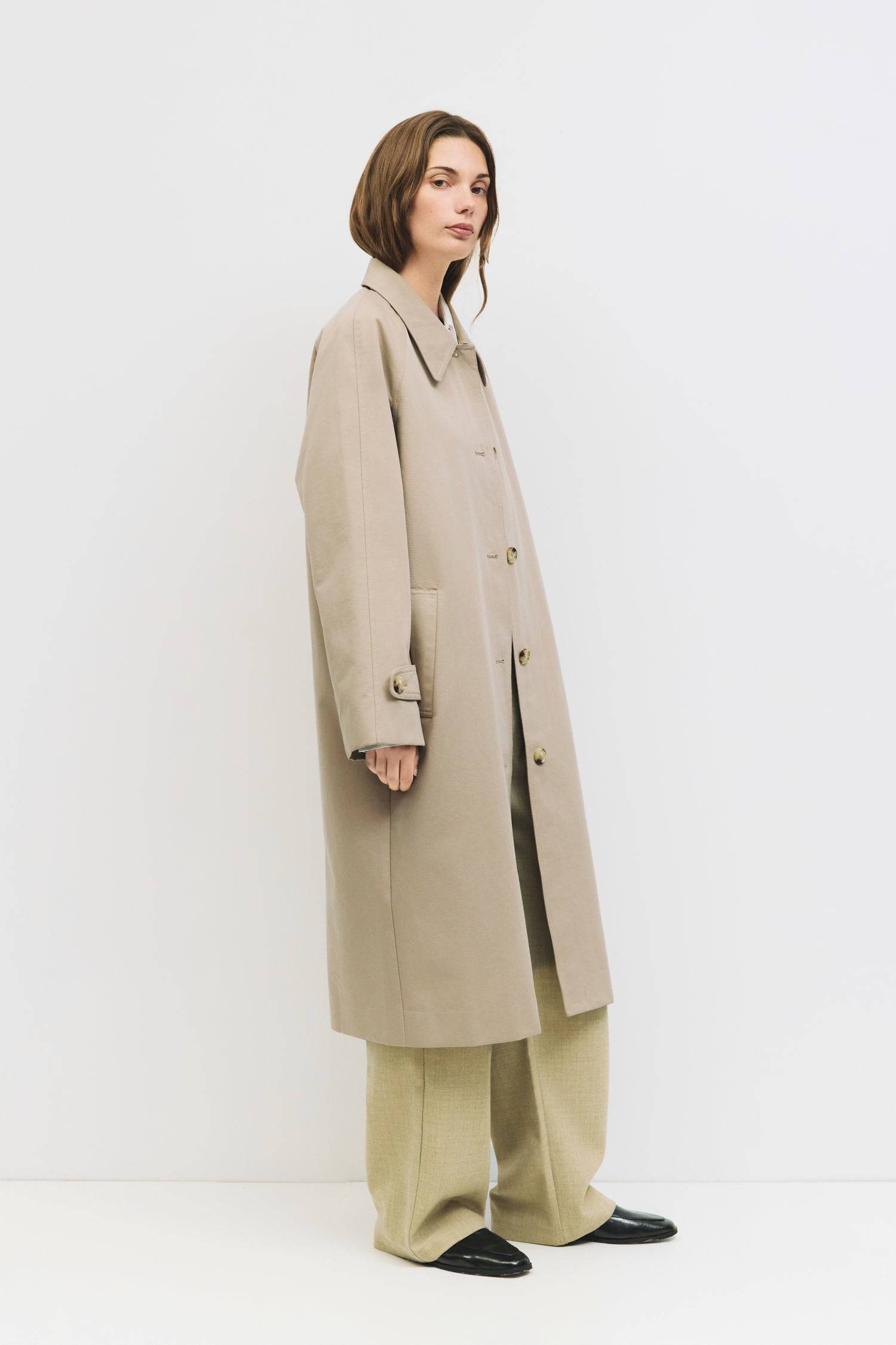 9045717582045, The Serena Coat, Outerwear, Mod Ref, beige,cf-color-beige,cf-color-olive,cf-size-l,cf-size-m,cf-size-s,cf-vendor-mod-ref,Coat,coat jacket,Comfort,Comfortable,Detail,Details,Fall,layer,layering,Layers,Long,Long Sleeve,midi length,modref,new,Olive,Outerwear,Oversized,Oversized Coat,Peacoat,Pockets,scarf,Spring,Summer,Transitional,Trench,Trench Coat,Womens, Information The Serena Coat blends timeless tailoring with contemporary ease, featuring a pointed collar and raglan sleeves for a relaxed ye