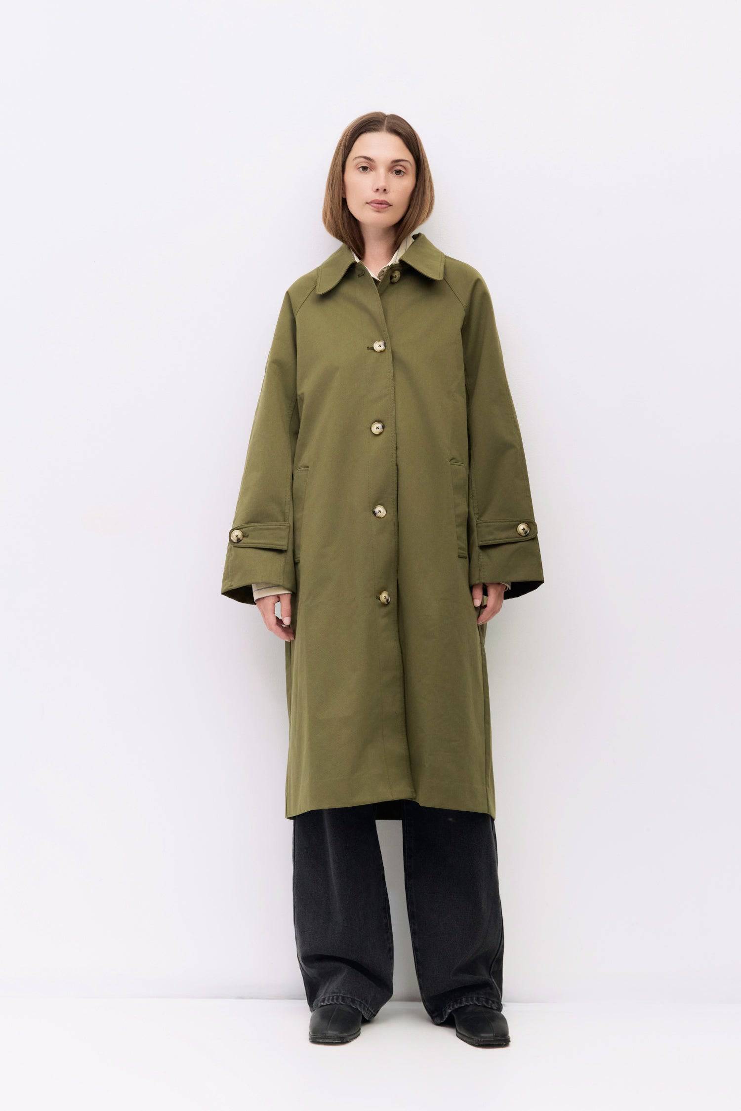 9045717582045, The Serena Coat, Outerwear, Mod Ref, beige,cf-color-beige,cf-color-olive,cf-size-l,cf-size-m,cf-size-s,cf-vendor-mod-ref,Coat,coat jacket,Comfort,Comfortable,Detail,Details,Fall,layer,layering,Layers,Long,Long Sleeve,midi length,modref,new,Olive,Outerwear,Oversized,Oversized Coat,Peacoat,Pockets,scarf,Spring,Summer,Transitional,Trench,Trench Coat,Womens, Information The Serena Coat blends timeless tailoring with contemporary ease, featuring a pointed collar and raglan sleeves for a relaxed ye