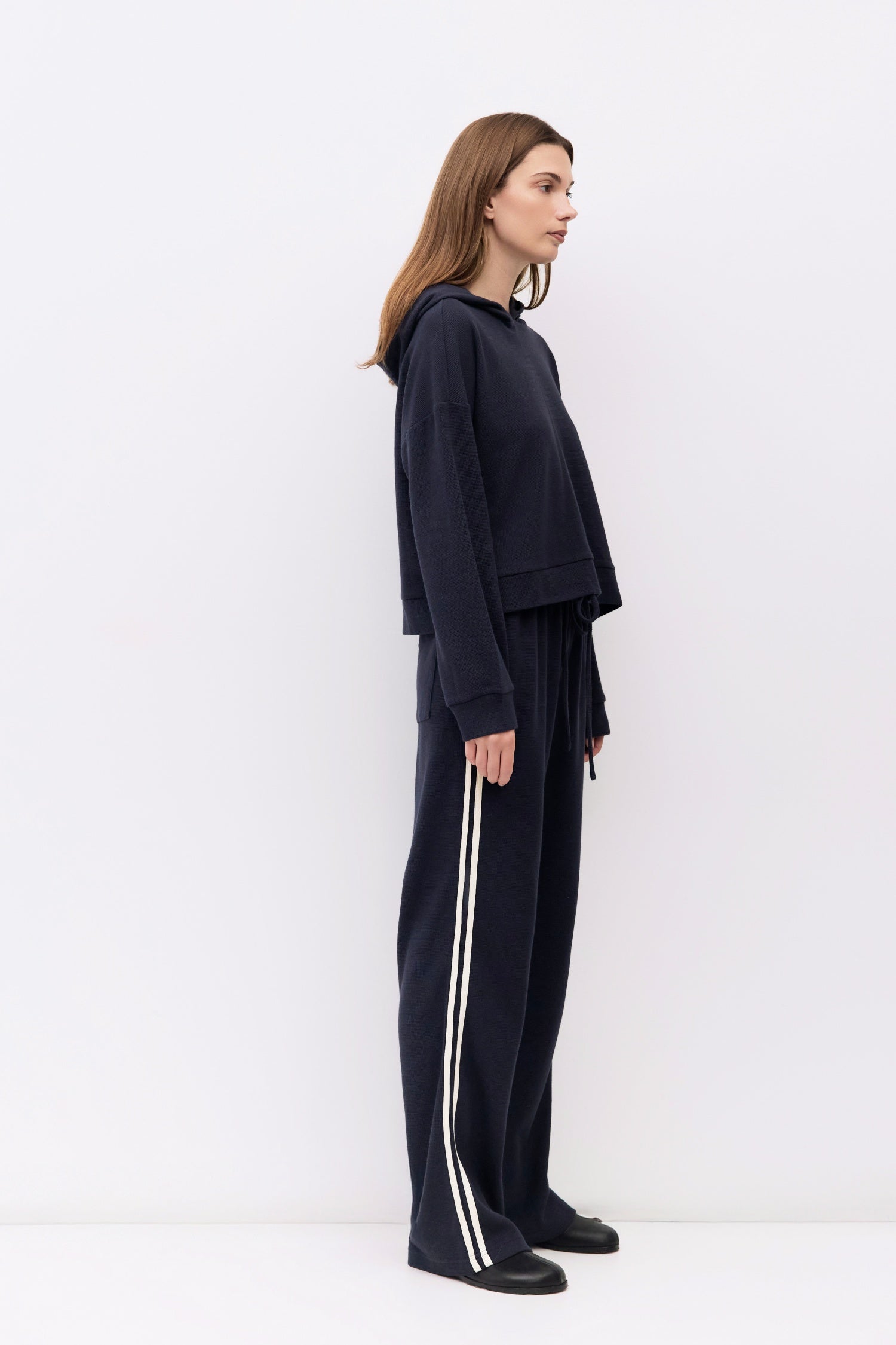 9084508078301, The Enzo Pants, Bottoms, All Row, Basic,Basics,Bottoms,brown,Casual,cf-color-brown,cf-color-navy,cf-size-l,cf-size-m,cf-size-s,cf-vendor-mod-ref,Chestnut Brown,Comfortable,dark brown,Drawstring,drawstring waist,Everyday,Long Pants,Lounge,Loungewear,mid rise,modref,Navy,Pants,Patch Pockets,Relaxed,Relaxed Fit,Sets,Spring,waffle knit,Wide Leg,Wide Leg Pants,women,Womens, Information The Enzo Pants blend sporty style with relaxed comfort, featuring a wide-leg fit and elastic drawstring waistband
