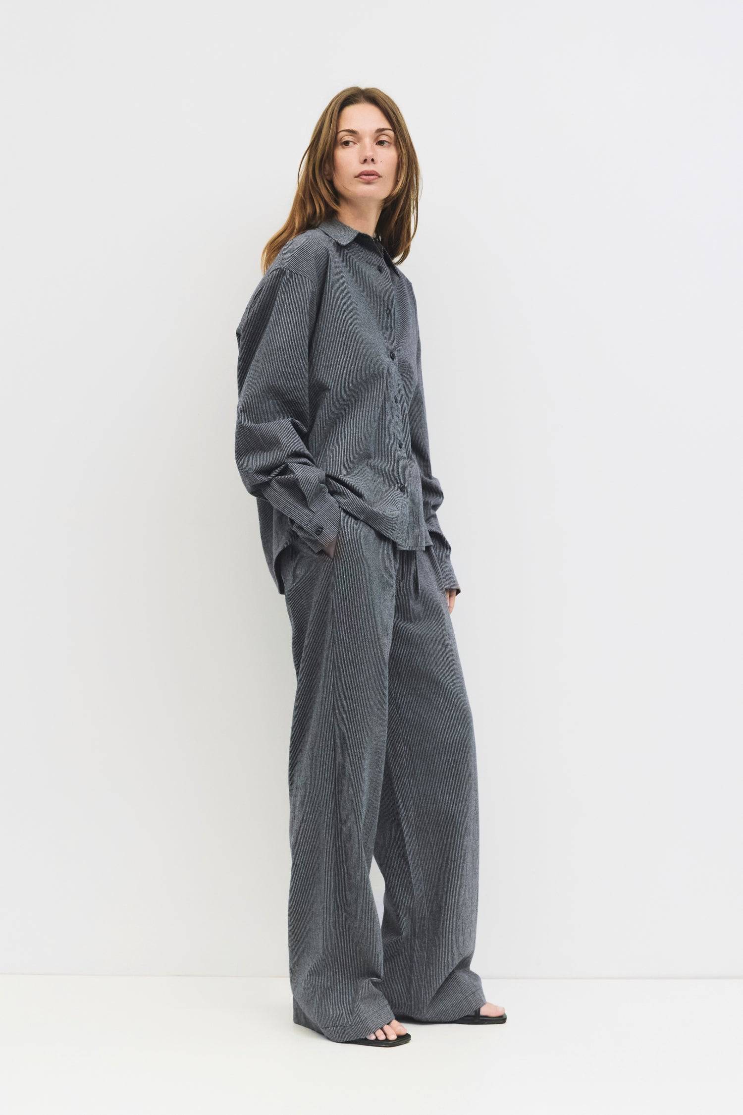 9084461056221, The Ellen Pants, Bottoms, All Row, Basic,Basics,Bottoms,Casual,cf-size-l,cf-size-m,cf-size-s,cf-vendor-mod-ref,Comfortable,Everyday,Front Pocket,Long Pants,mid rise,modref,Pants,Patch Pockets,Pleated,Pockets,Sets,Spring,straight fit,Transitional,white,women,Womens, Information The Ellen Pants are oversized striped trousers crafted from brushed midweight fabric, featuring front pleats for a tailored touch. Designed with a back elastic waistband, front button, and hidden zipper closure, and two