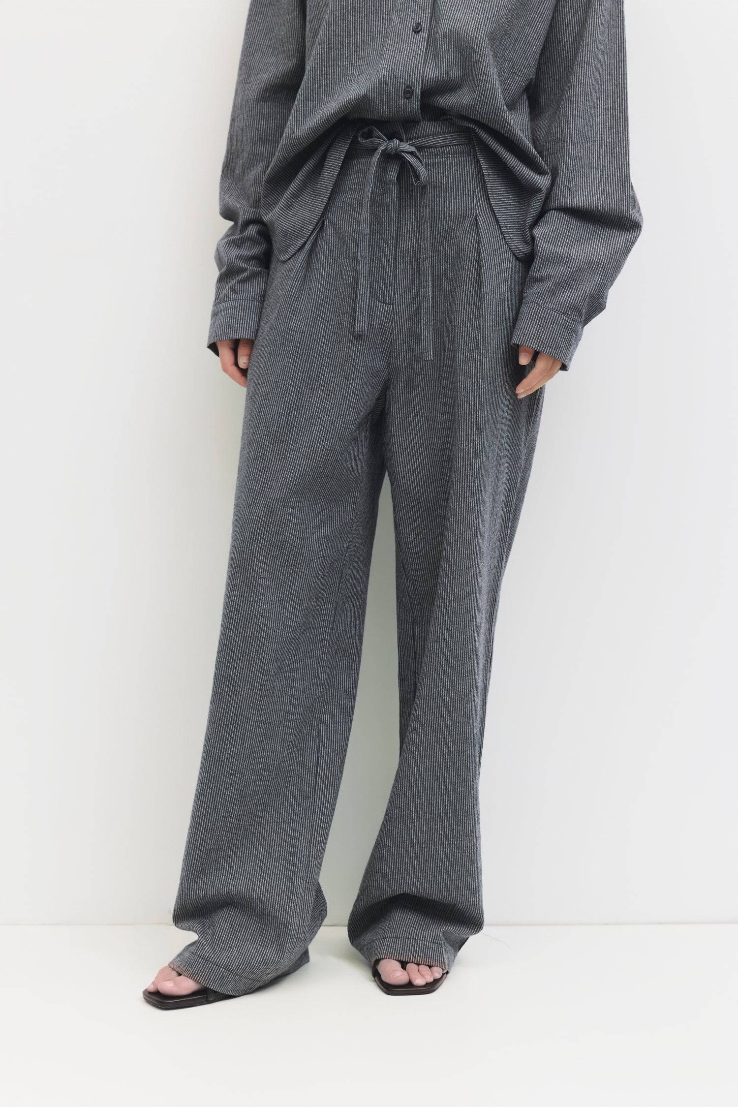 9084461056221, The Ellen Pants, Bottoms, All Row, Basic,Basics,Bottoms,Casual,cf-size-l,cf-size-m,cf-size-s,cf-vendor-mod-ref,Comfortable,Everyday,Front Pocket,Long Pants,mid rise,modref,Pants,Patch Pockets,Pleated,Pockets,Sets,Spring,straight fit,Transitional,white,women,Womens, Information The Ellen Pants are oversized striped trousers crafted from brushed midweight fabric, featuring front pleats for a tailored touch. Designed with a back elastic waistband, front button, and hidden zipper closure, and two