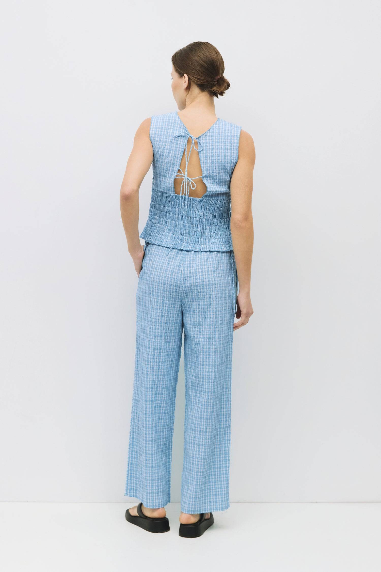 8983732879581, The Ebony Pants, Bottoms, All Row, Basic,Basics,Bottoms,Casual,cf-size-l,cf-size-m,cf-size-s,cf-vendor-mod-ref,Comfortable,Everyday,Front Pocket,Long Pants,mid rise,modref,Pants,Patch Pockets,Pleated,Pockets,Sets,Spring,straight fit,Transitional,white,women,Womens, Information The Ebony Pants are relaxed-fit, ankle-length plaid pants with an elasticized waistband and adjustable side ties for the perfect fit. Their wide-leg silhouette makes them an easy, comfortable choice for everyday wear an