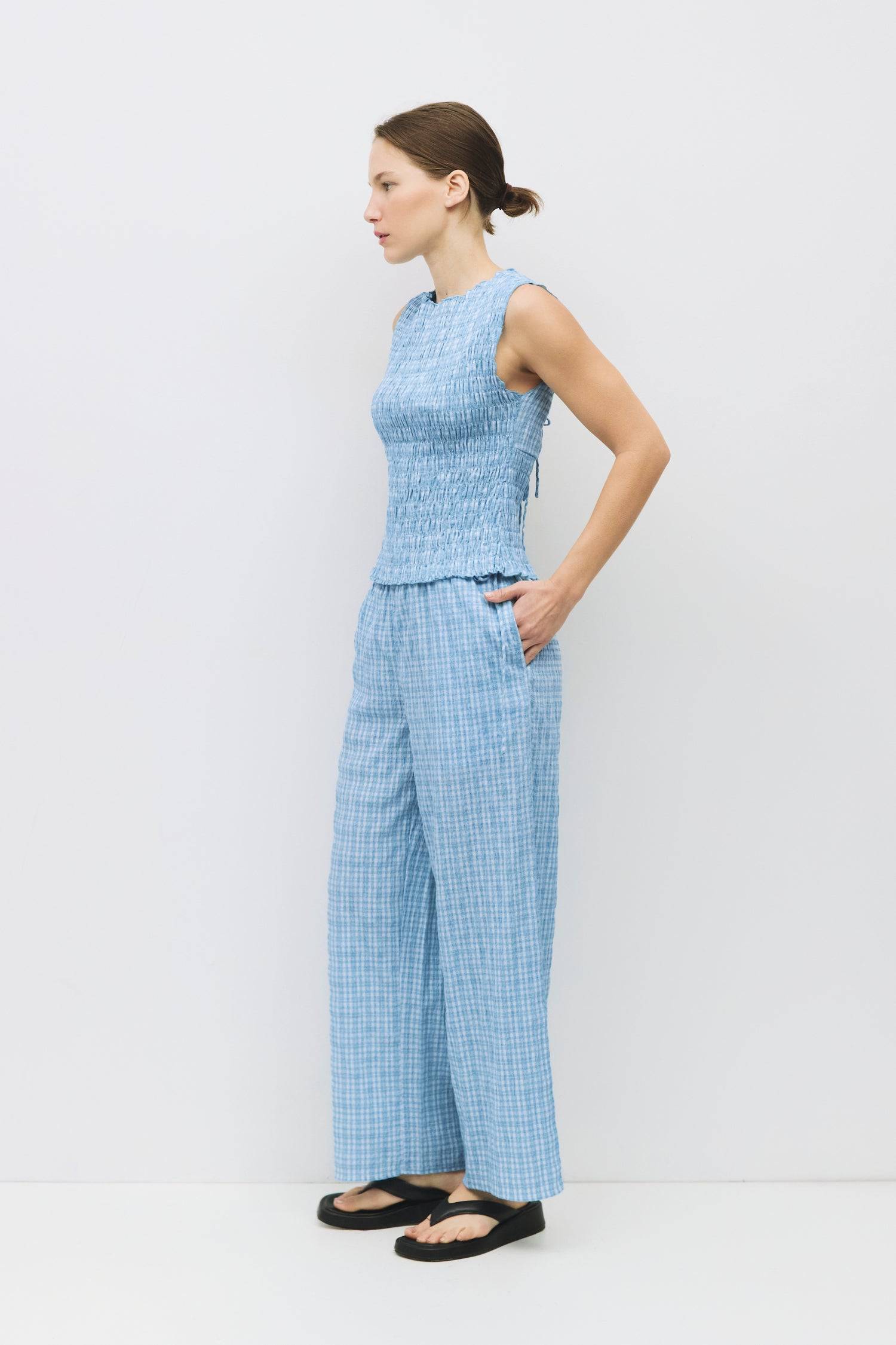 8983732879581, The Ebony Pants, Bottoms, All Row, Basic,Basics,Bottoms,Casual,cf-size-l,cf-size-m,cf-size-s,cf-vendor-mod-ref,Comfortable,Everyday,Front Pocket,Long Pants,mid rise,modref,Pants,Patch Pockets,Pleated,Pockets,Sets,Spring,straight fit,Transitional,white,women,Womens, Information The Ebony Pants are relaxed-fit, ankle-length plaid pants with an elasticized waistband and adjustable side ties for the perfect fit. Their wide-leg silhouette makes them an easy, comfortable choice for everyday wear an
