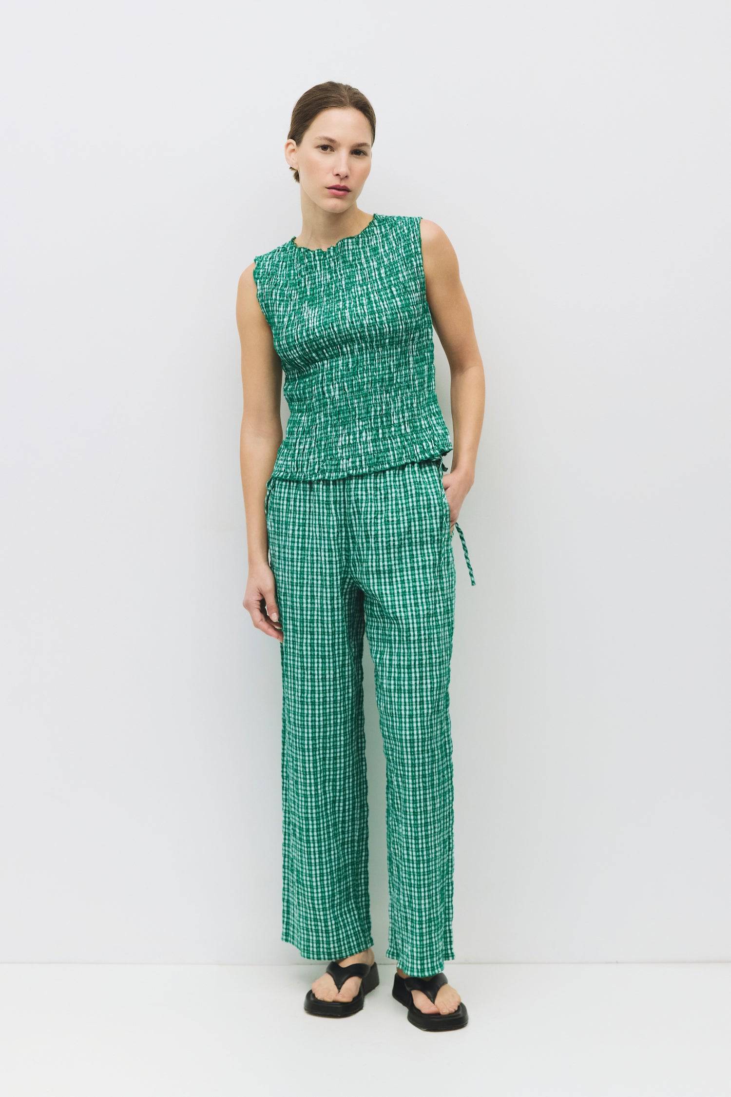 8983732879581, The Ebony Pants, Bottoms, All Row, Basic,Basics,Bottoms,Casual,cf-size-l,cf-size-m,cf-size-s,cf-vendor-mod-ref,Comfortable,Everyday,Front Pocket,Long Pants,mid rise,modref,Pants,Patch Pockets,Pleated,Pockets,Sets,Spring,straight fit,Transitional,white,women,Womens, Information The Ebony Pants are relaxed-fit, ankle-length plaid pants with an elasticized waistband and adjustable side ties for the perfect fit. Their wide-leg silhouette makes them an easy, comfortable choice for everyday wear an