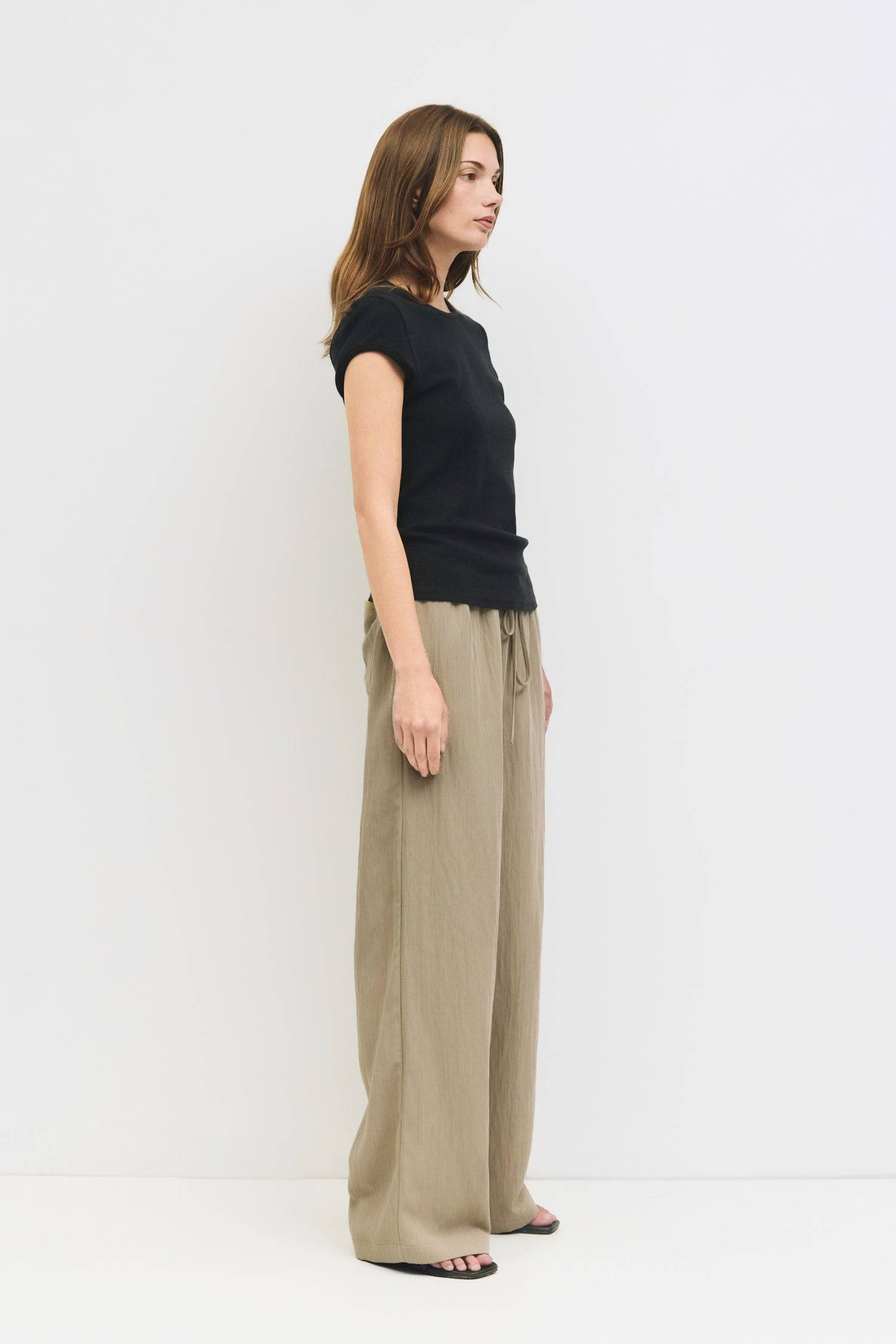 9045669282013, The Matilda Pants, Bottoms, Mod Ref, beige,Breathable,brown,Casual,cf-color-beige,cf-color-bone,cf-color-brown,cf-color-olive,cf-size-l,cf-size-m,cf-size-s,cf-vendor-mod-ref,Cotton,Elastic,Elastic Waistband,everyday,Front Tie,front ties,ivory,Lightweight,Long Pants,new,nylon,Pants,Pocket,Pockets,Relaxed,Relaxed Fit,Semi-Casual,side pockets,Tie,wide,Wide Leg,Wide Leg Pants,womens, Information The Matilda Pants are wide-leg pull-on pants designed with an adjustable elastic waistband and feature