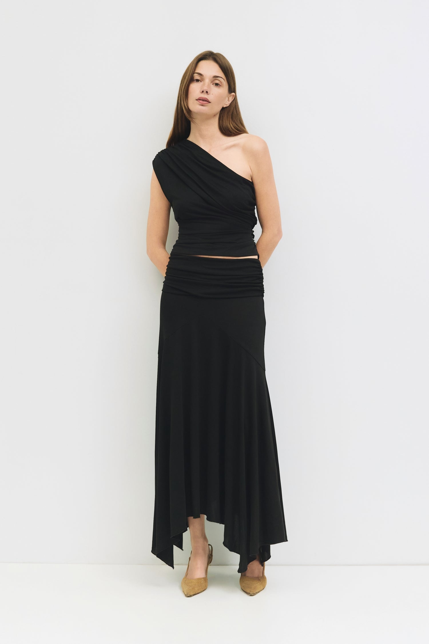 9065329950941, The Oceane Skirt, Bottoms, All Row, Black,Bottom,Bottoms,Breathable,cf-color-black,cf-color-white,cf-size-l,cf-size-m,cf-size-s,cf-vendor-all-row,Comfortable,dressy,Elastic,Elastic Waist,Elastic Waistband,Elegant,everyday,High Waist,matching,Matching Set,Maxi,maxi skirt,new,ruched,Semi-Formal,Skirt,spring,Summer,versatile,womens, Information The Oceane Skirt is designed with a softly draped handkerchief hem for effortless movement. The ruched elastic waist creates a flattering, sculpted shape