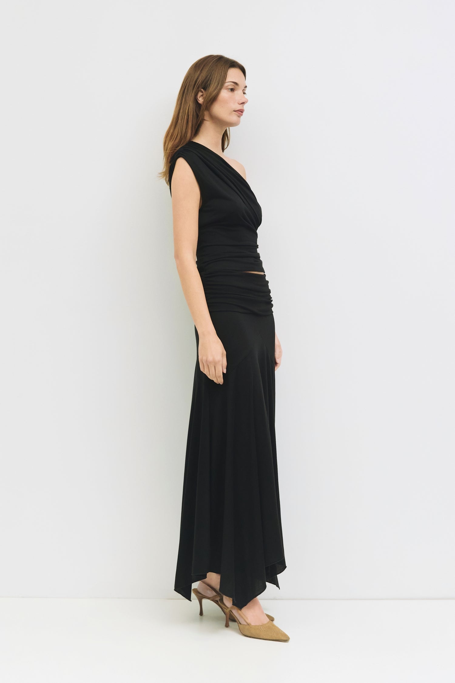 9065329950941, The Oceane Skirt, Bottoms, All Row, Black,Bottom,Bottoms,Breathable,cf-color-black,cf-color-white,cf-size-l,cf-size-m,cf-size-s,cf-vendor-all-row,Comfortable,dressy,Elastic,Elastic Waist,Elastic Waistband,Elegant,everyday,High Waist,matching,Matching Set,Maxi,maxi skirt,new,ruched,Semi-Formal,Skirt,spring,Summer,versatile,womens, Information The Oceane Skirt is designed with a softly draped handkerchief hem for effortless movement. The ruched elastic waist creates a flattering, sculpted shape