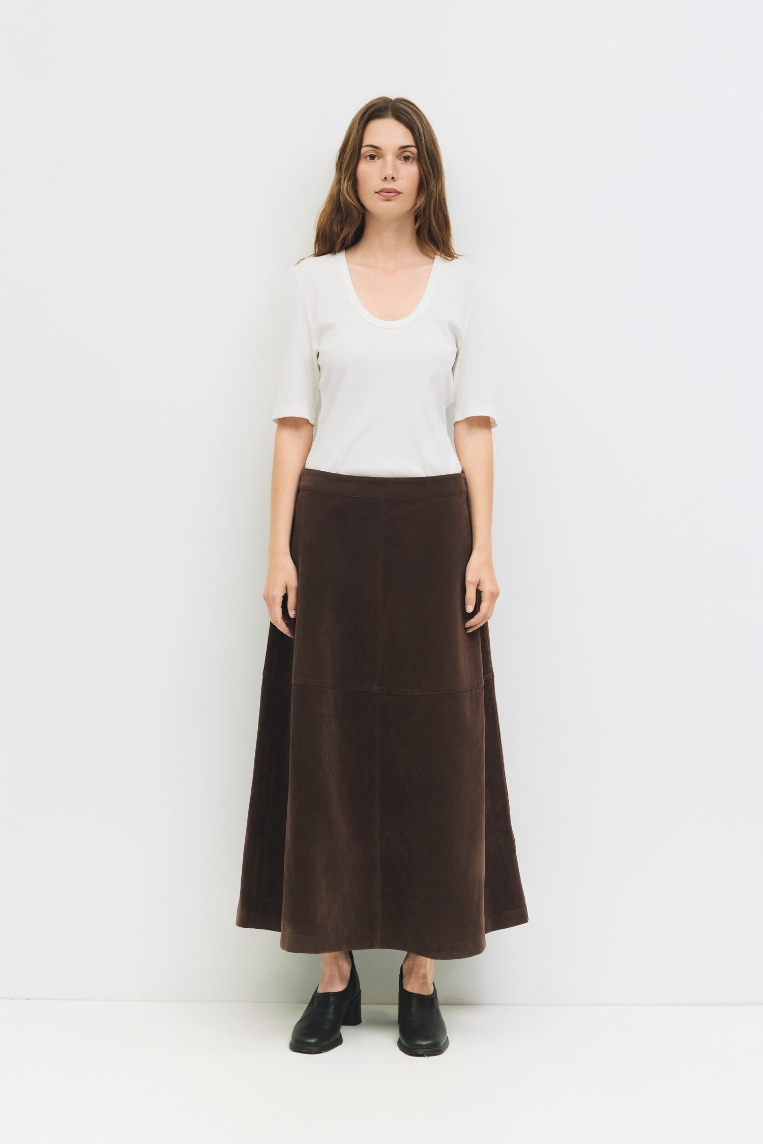 9084503818461, The Eryn Skirt, Bottoms, All Row, Bottom,Bottoms,brown,cf-color-brown,cf-color-khaki,cf-size-l,cf-size-m,cf-size-s,cf-vendor-all-row,Chestnut Brown,Comfortable,dark brown,everyday,Fall,Khaki,Matching Set,mid rise,mid waist,mid weight,Midi Skirt,new,Semi-Formal,set,Sets,Skirt,spring,Structured,suede,Textured Fabric,versatile,womens, Information The Eryn Skirt is a sleek A-line midi crafted from midweight suede, designed with a side invisible zipper and hidden hook-and-eye closure for a clean f