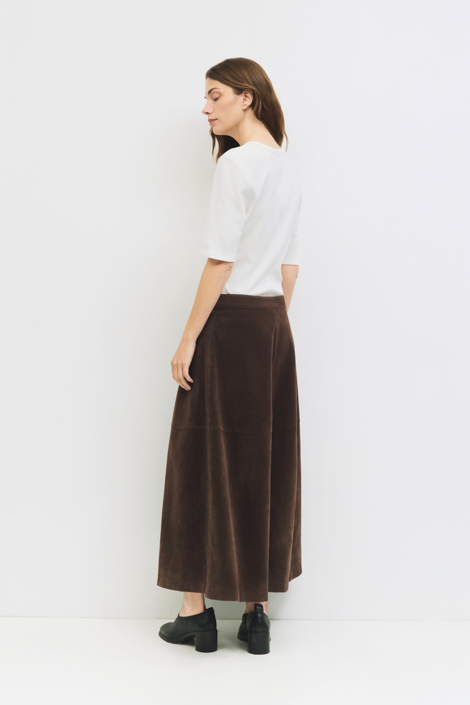 9084503818461, The Eryn Skirt, Bottoms, All Row, Bottom,Bottoms,brown,cf-color-brown,cf-color-khaki,cf-size-l,cf-size-m,cf-size-s,cf-vendor-all-row,Chestnut Brown,Comfortable,dark brown,everyday,Fall,Khaki,Matching Set,mid rise,mid waist,mid weight,Midi Skirt,new,Semi-Formal,set,Sets,Skirt,spring,Structured,suede,Textured Fabric,versatile,womens, Information The Eryn Skirt is a sleek A-line midi crafted from midweight suede, designed with a side invisible zipper and hidden hook-and-eye closure for a clean f