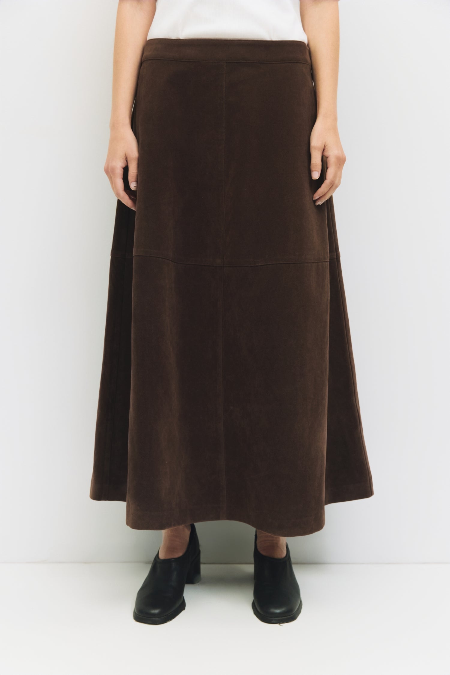 9084503818461, The Eryn Skirt, Bottoms, All Row, Bottom,Bottoms,brown,cf-color-brown,cf-color-khaki,cf-size-l,cf-size-m,cf-size-s,cf-vendor-all-row,Chestnut Brown,Comfortable,dark brown,everyday,Fall,Khaki,Matching Set,mid rise,mid waist,mid weight,Midi Skirt,new,Semi-Formal,set,Sets,Skirt,spring,Structured,suede,Textured Fabric,versatile,womens, Information The Eryn Skirt is a sleek A-line midi crafted from midweight suede, designed with a side invisible zipper and hidden hook-and-eye closure for a clean f