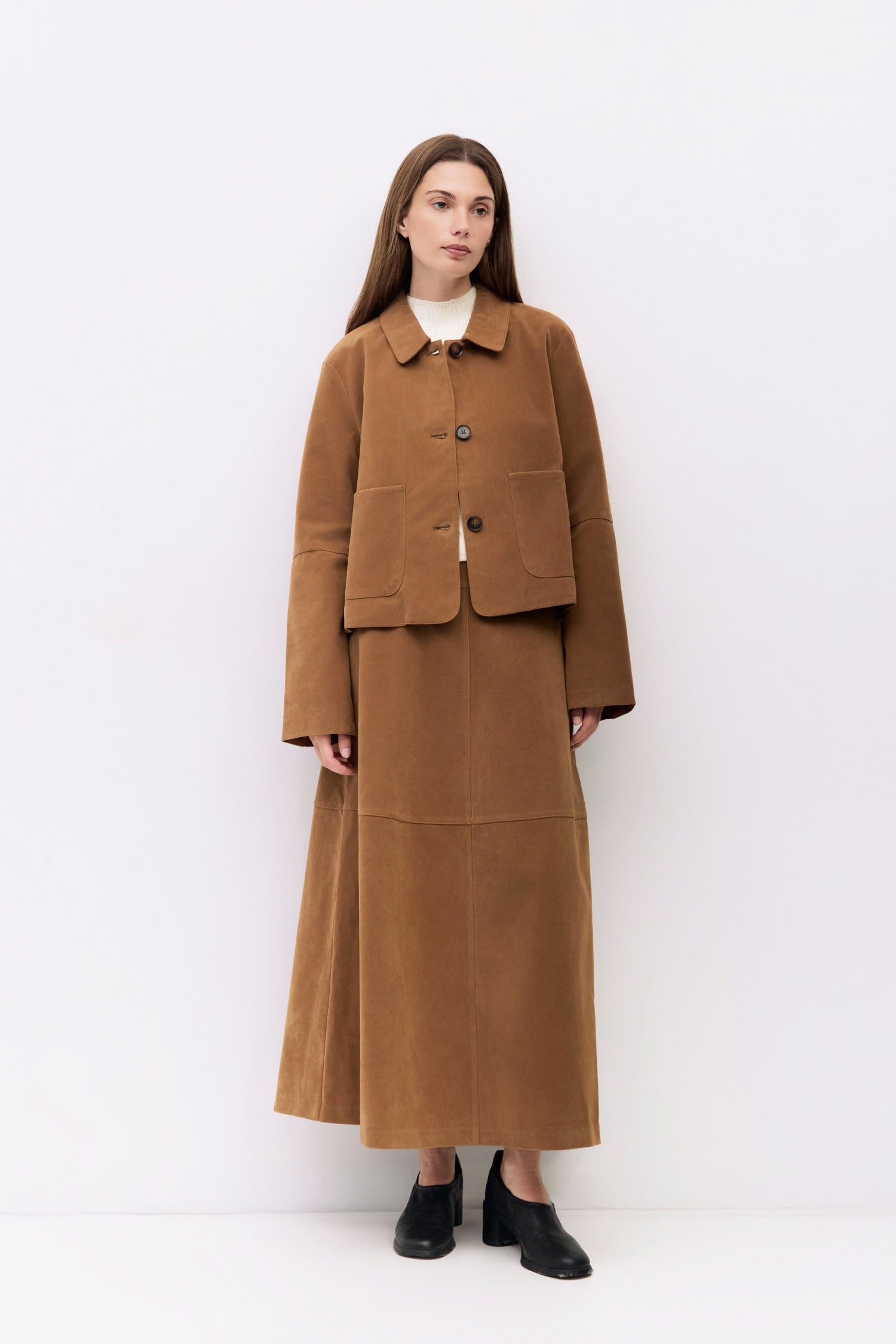 9084503818461, The Eryn Skirt, Bottoms, All Row, Bottom,Bottoms,brown,cf-color-brown,cf-color-khaki,cf-size-l,cf-size-m,cf-size-s,cf-vendor-all-row,Chestnut Brown,Comfortable,dark brown,everyday,Fall,Khaki,Matching Set,mid rise,mid waist,mid weight,Midi Skirt,new,Semi-Formal,set,Sets,Skirt,spring,Structured,suede,Textured Fabric,versatile,womens, Information The Eryn Skirt is a sleek A-line midi crafted from midweight suede, designed with a side invisible zipper and hidden hook-and-eye closure for a clean f