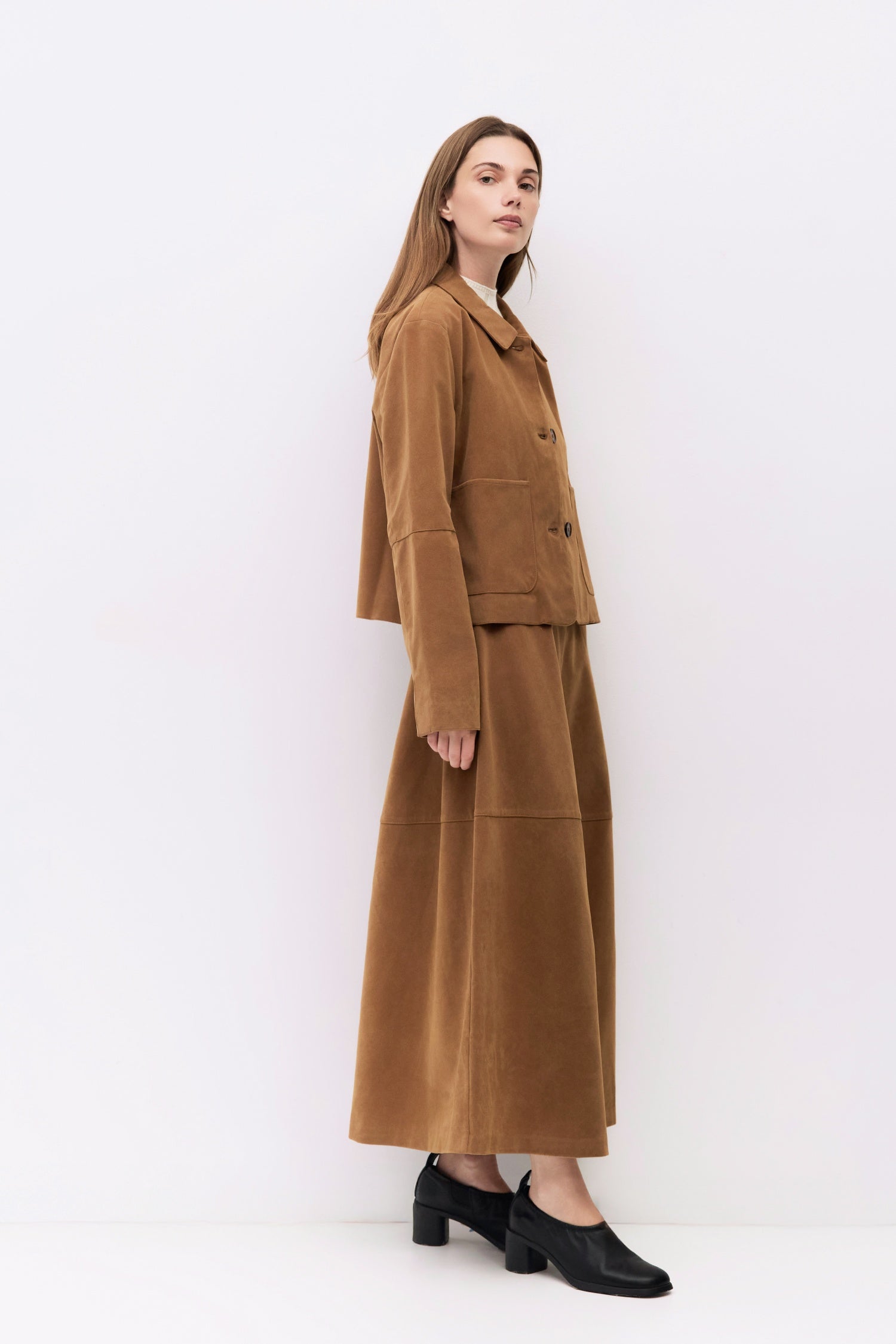 9084503818461, The Eryn Skirt, Bottoms, All Row, Bottom,Bottoms,brown,cf-color-brown,cf-color-khaki,cf-size-l,cf-size-m,cf-size-s,cf-vendor-all-row,Chestnut Brown,Comfortable,dark brown,everyday,Fall,Khaki,Matching Set,mid rise,mid waist,mid weight,Midi Skirt,new,Semi-Formal,set,Sets,Skirt,spring,Structured,suede,Textured Fabric,versatile,womens, Information The Eryn Skirt is a sleek A-line midi crafted from midweight suede, designed with a side invisible zipper and hidden hook-and-eye closure for a clean f