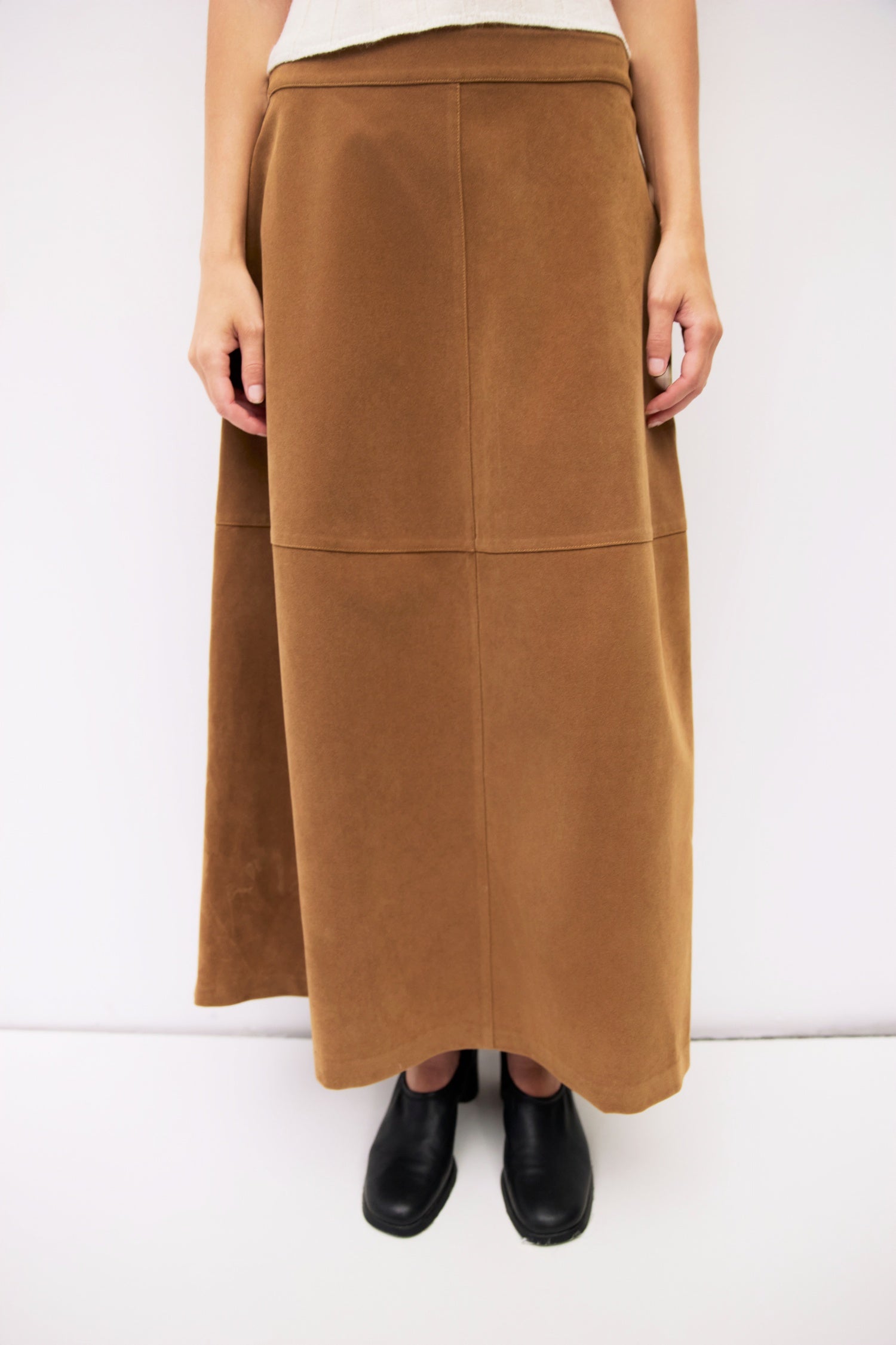 9084503818461, The Eryn Skirt, Bottoms, All Row, Bottom,Bottoms,brown,cf-color-brown,cf-color-khaki,cf-size-l,cf-size-m,cf-size-s,cf-vendor-all-row,Chestnut Brown,Comfortable,dark brown,everyday,Fall,Khaki,Matching Set,mid rise,mid waist,mid weight,Midi Skirt,new,Semi-Formal,set,Sets,Skirt,spring,Structured,suede,Textured Fabric,versatile,womens, Information The Eryn Skirt is a sleek A-line midi crafted from midweight suede, designed with a side invisible zipper and hidden hook-and-eye closure for a clean f
